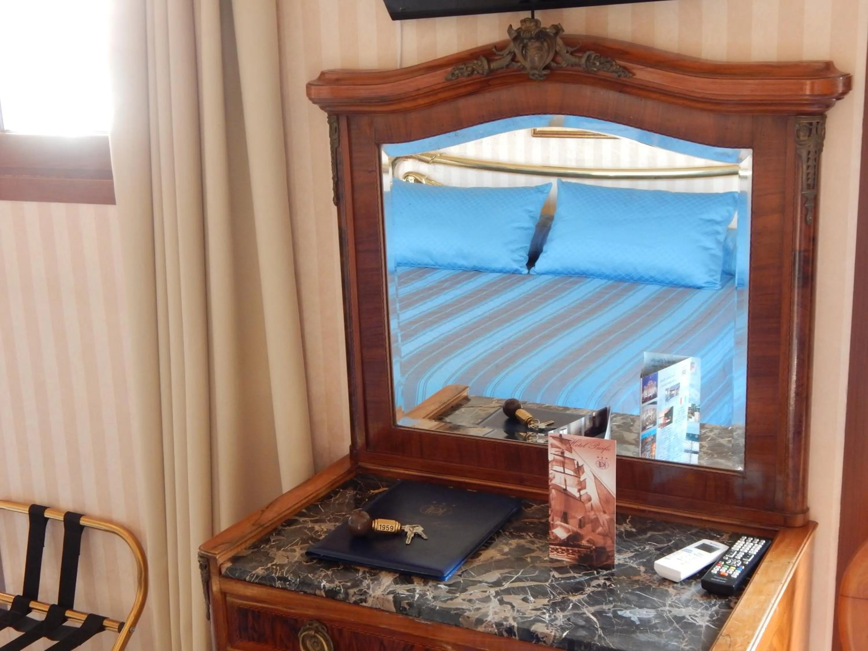 Bed in Hotel Pacific