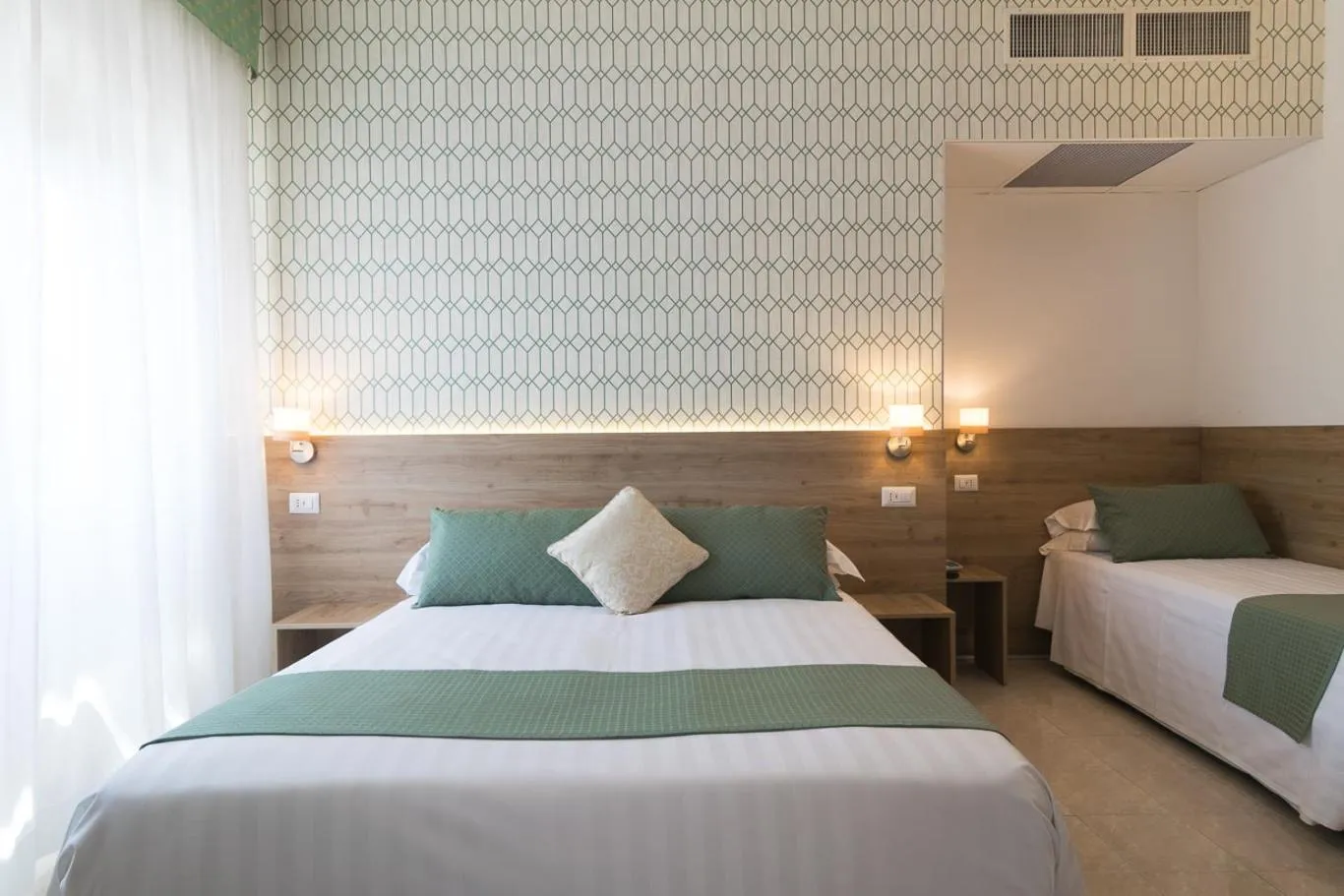 Bed in Hotel Pacific