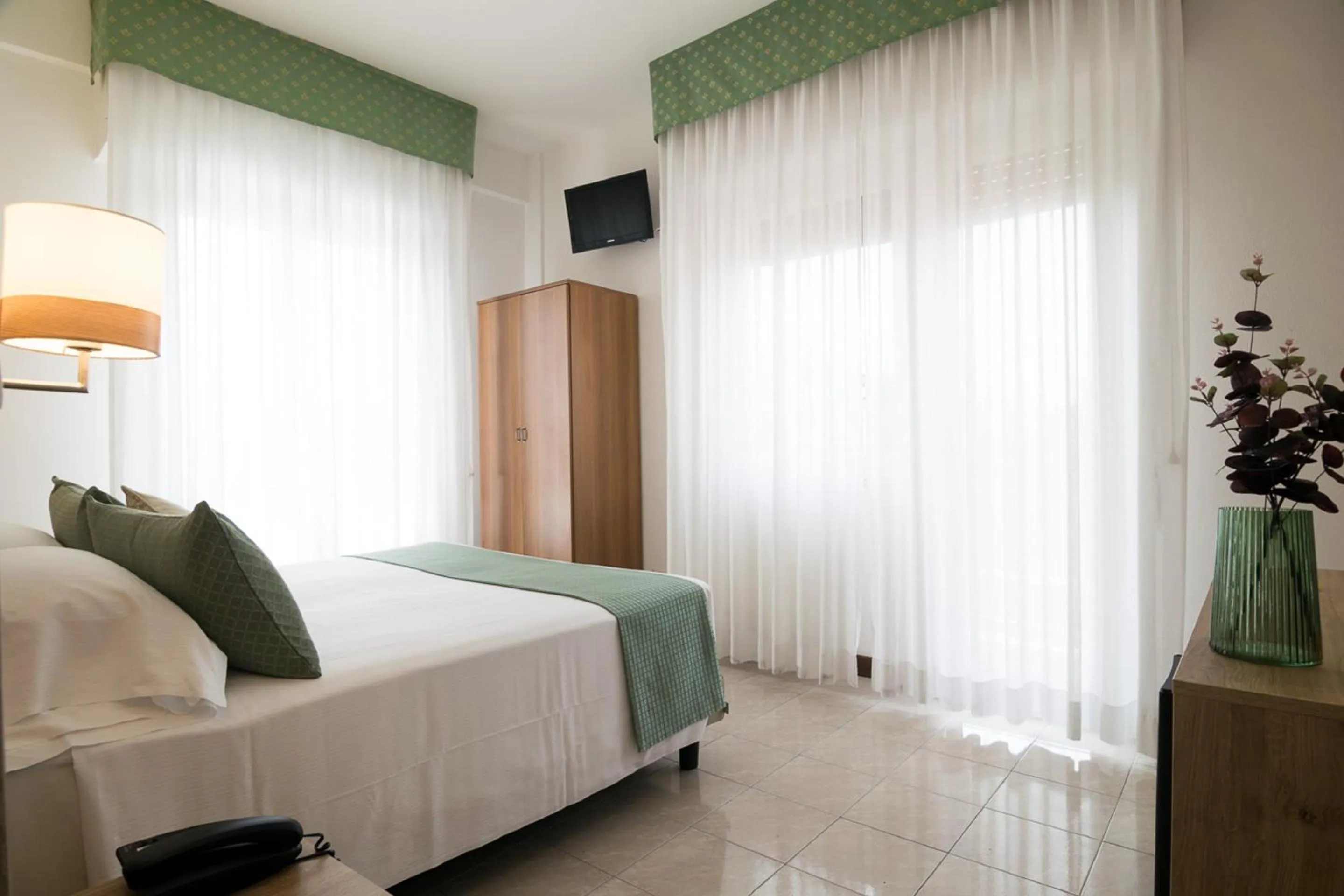 Bed in Hotel Pacific