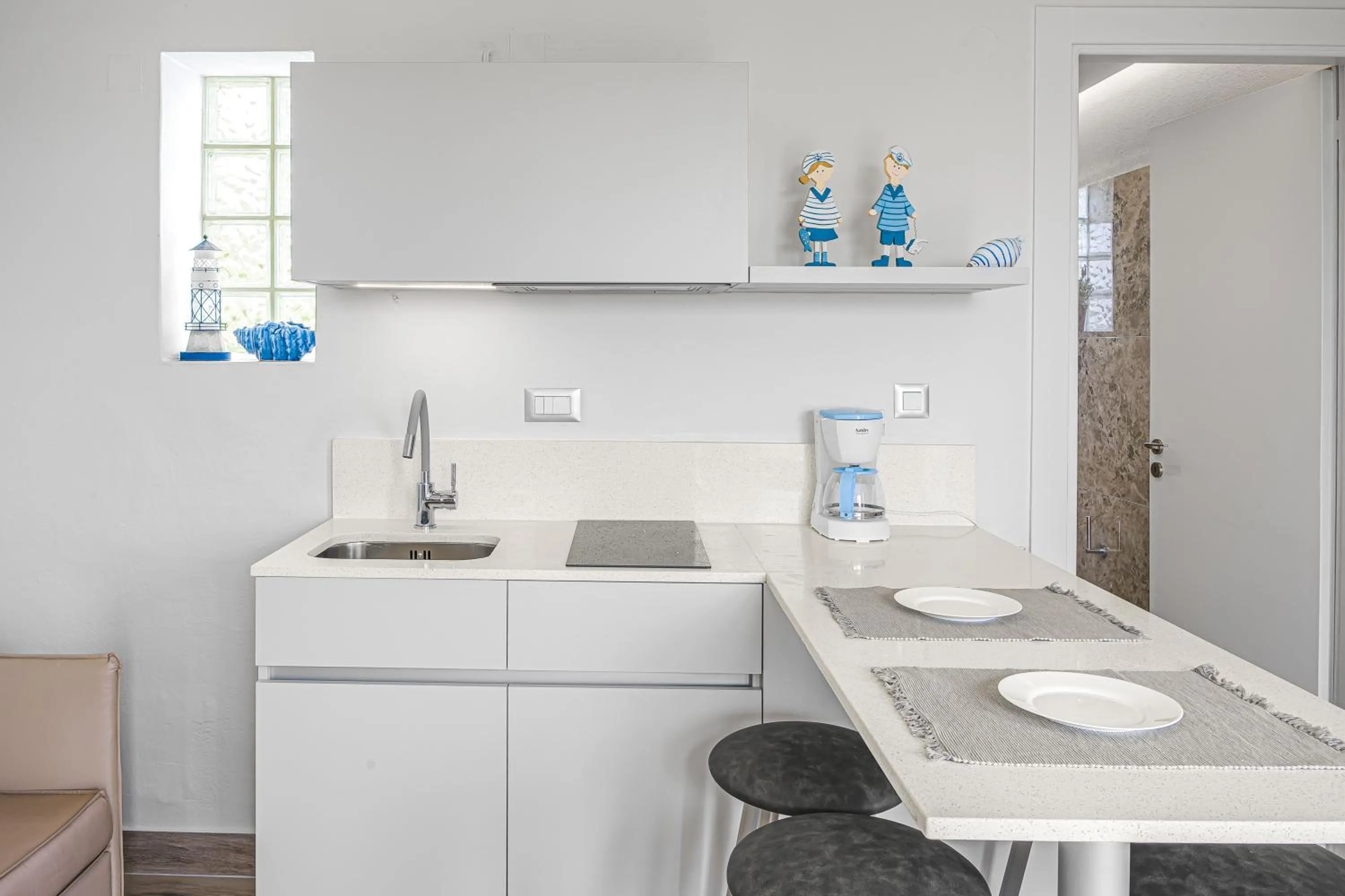 Kitchen or kitchenette in Sergiani Garden Hotel Apartments
