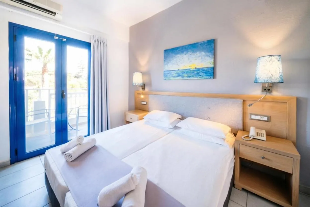 Bed in Sergiani Garden Hotel Apartments