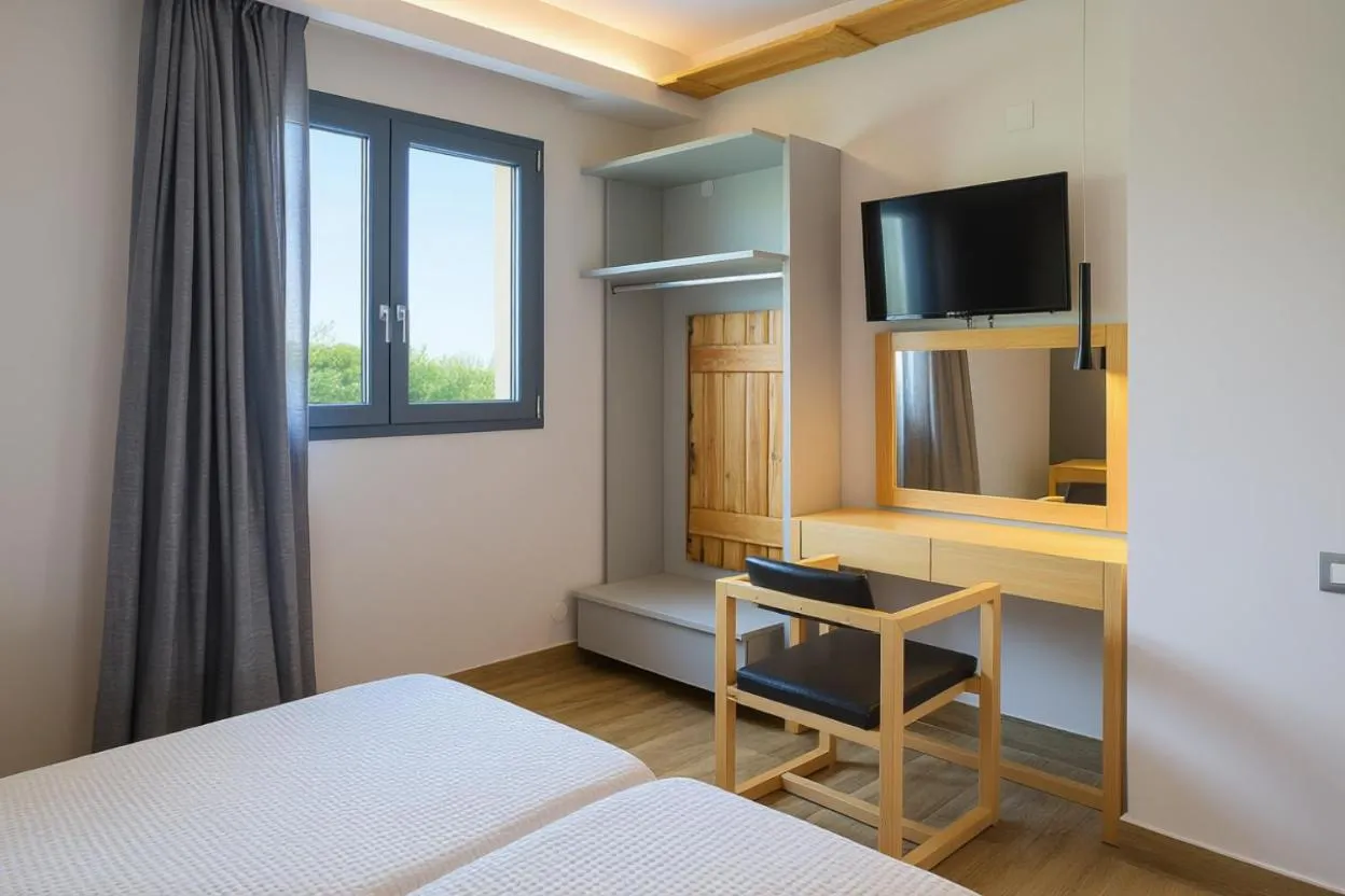 Bed in Sergiani Garden Hotel Apartments