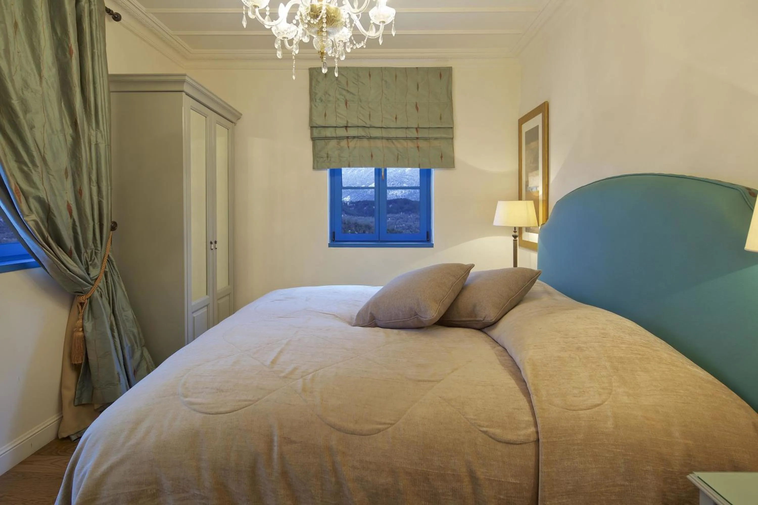 Bed in Zagori Suites Luxury Residences