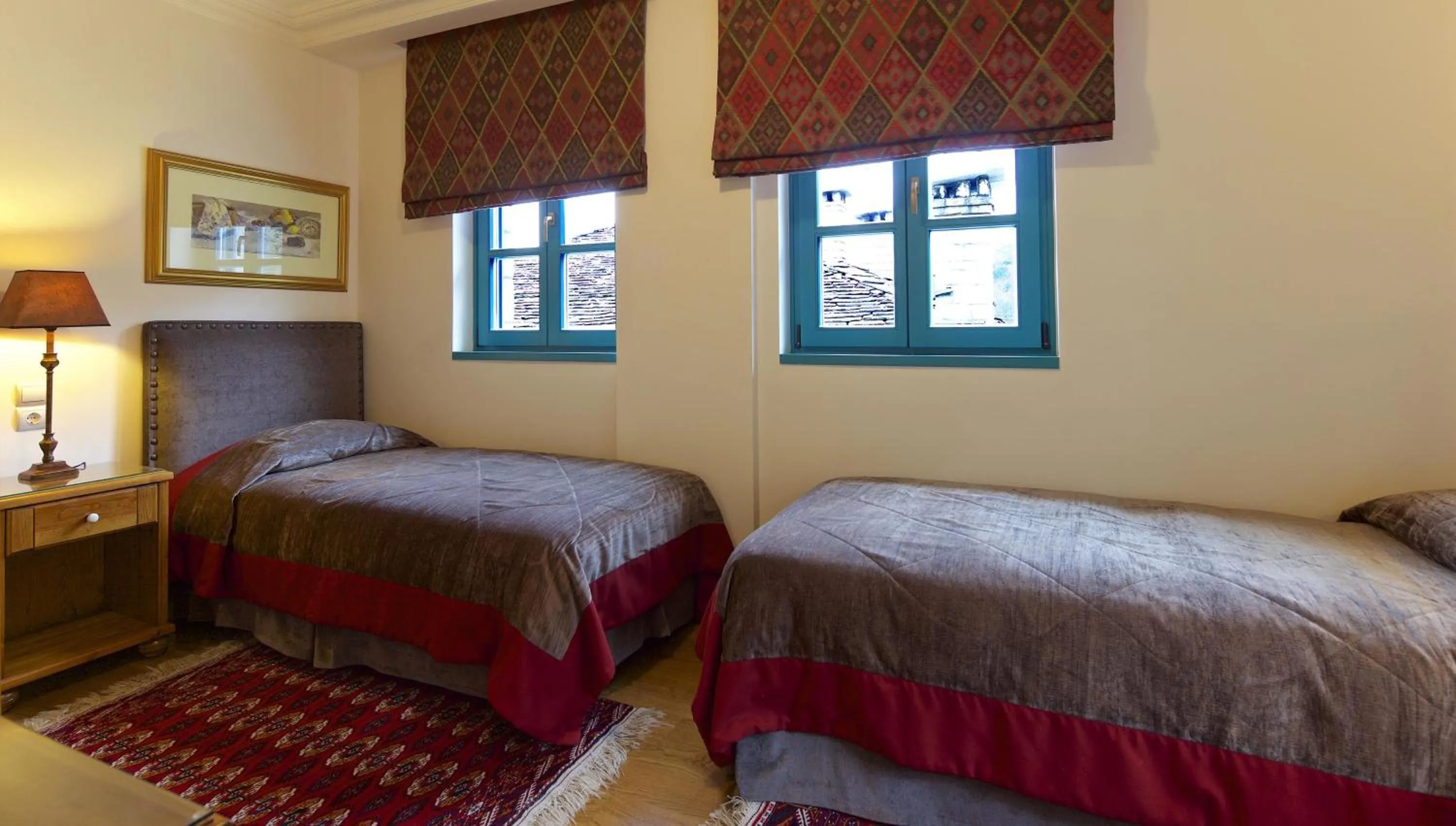 Bed in Zagori Suites Luxury Residences