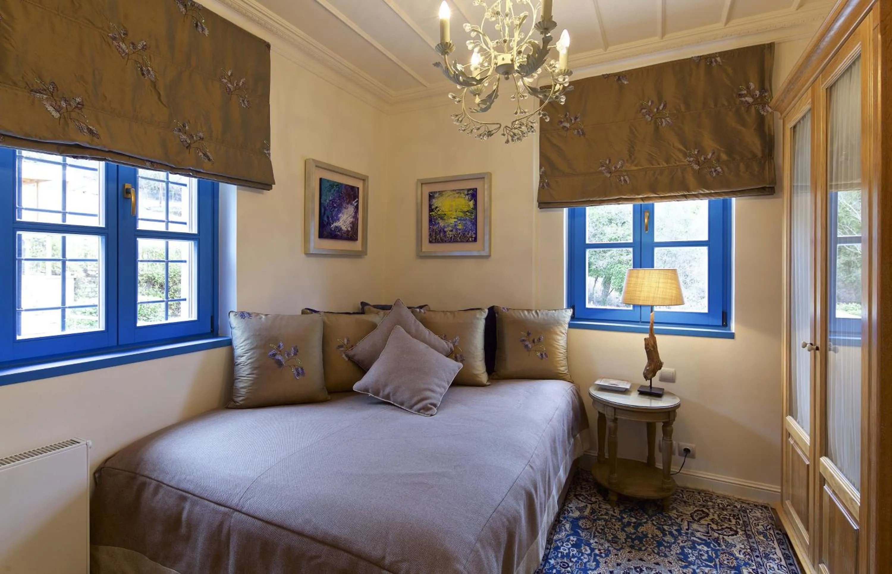 Bed in Zagori Suites Luxury Residences