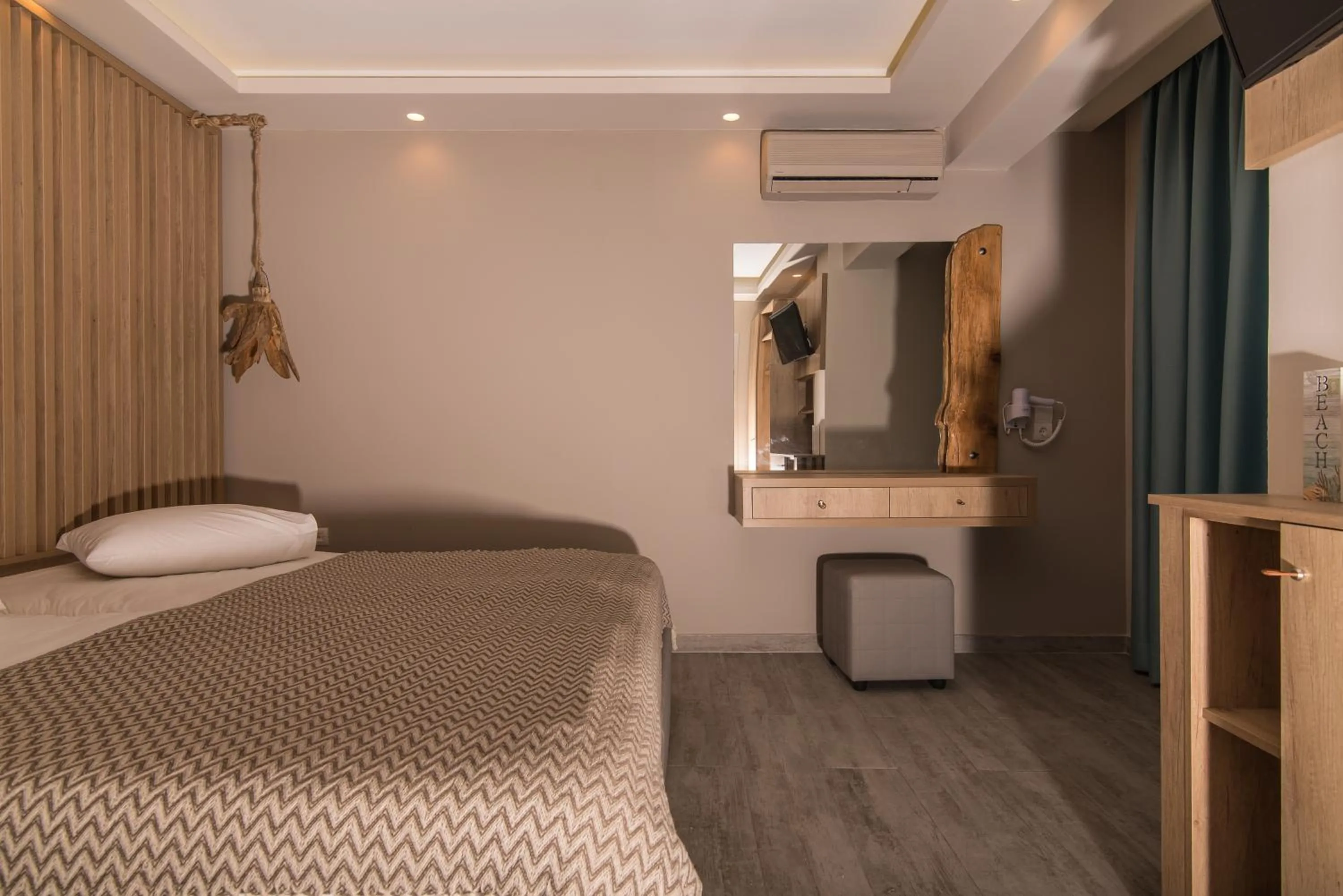 Photo of the whole room, Bed in Iniohos Zante Hotel & Suites