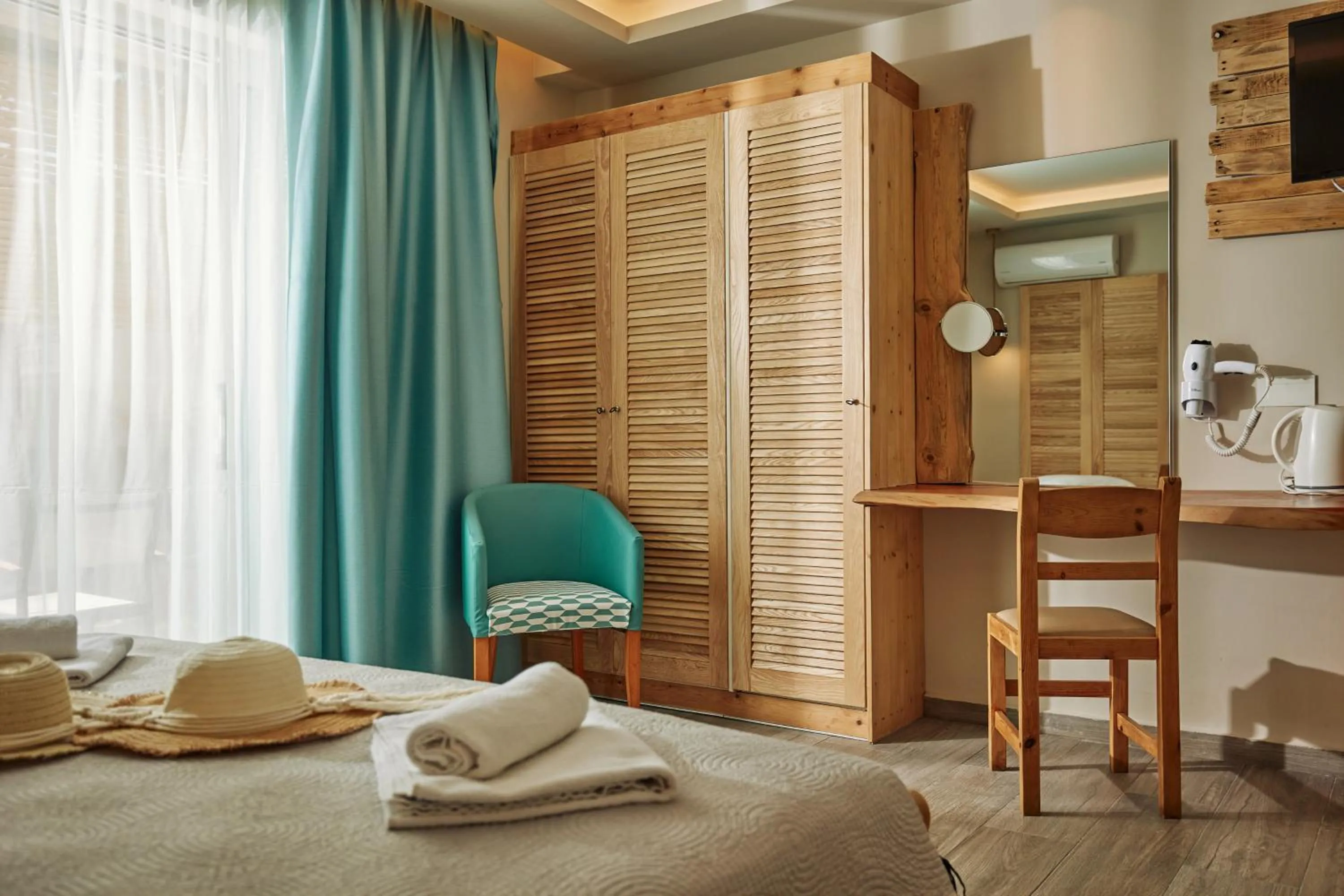 wardrobe, Bed in Iniohos Zante Hotel & Suites