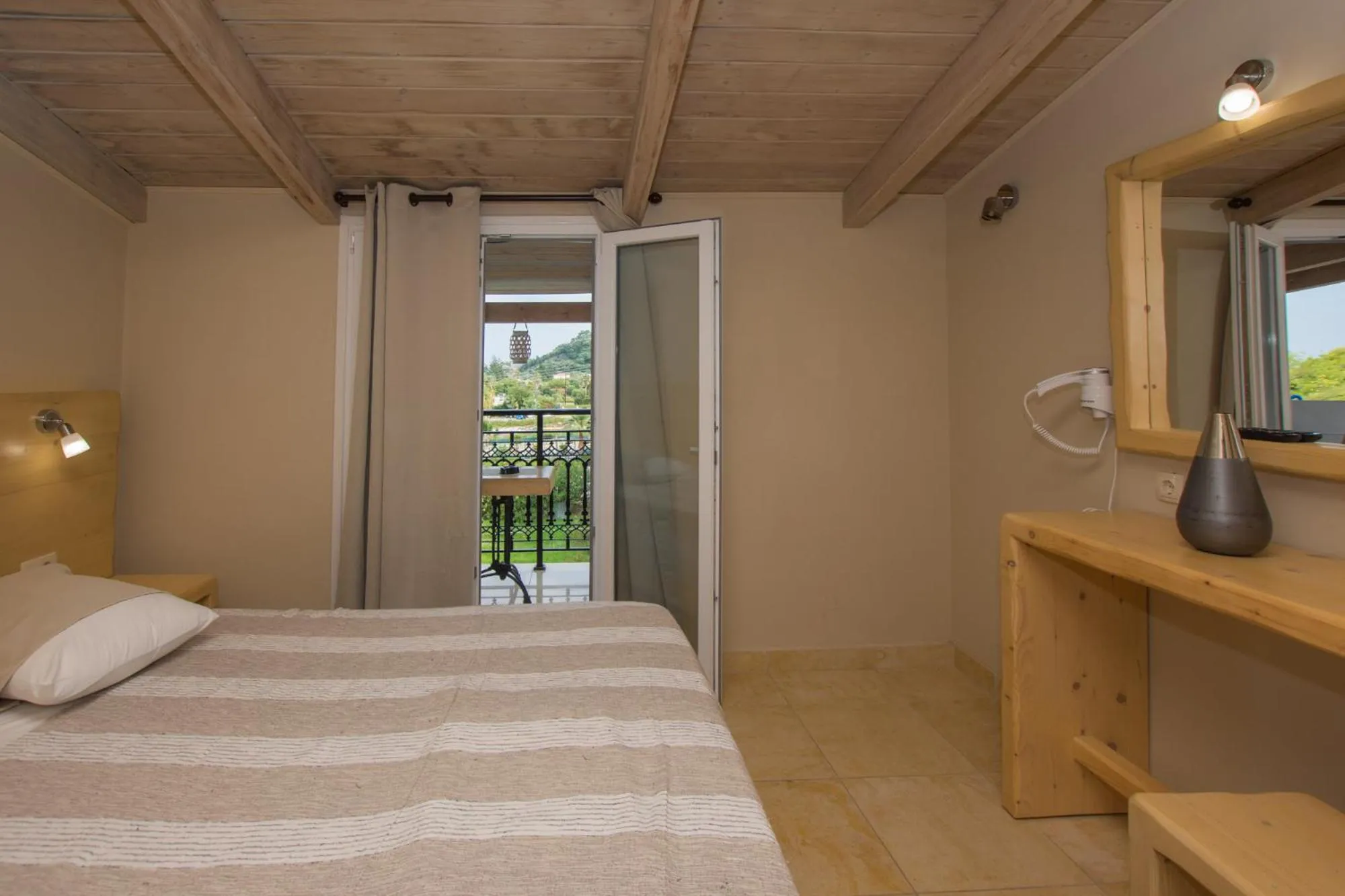 Photo of the whole room, Bed in Iniohos Zante Hotel & Suites