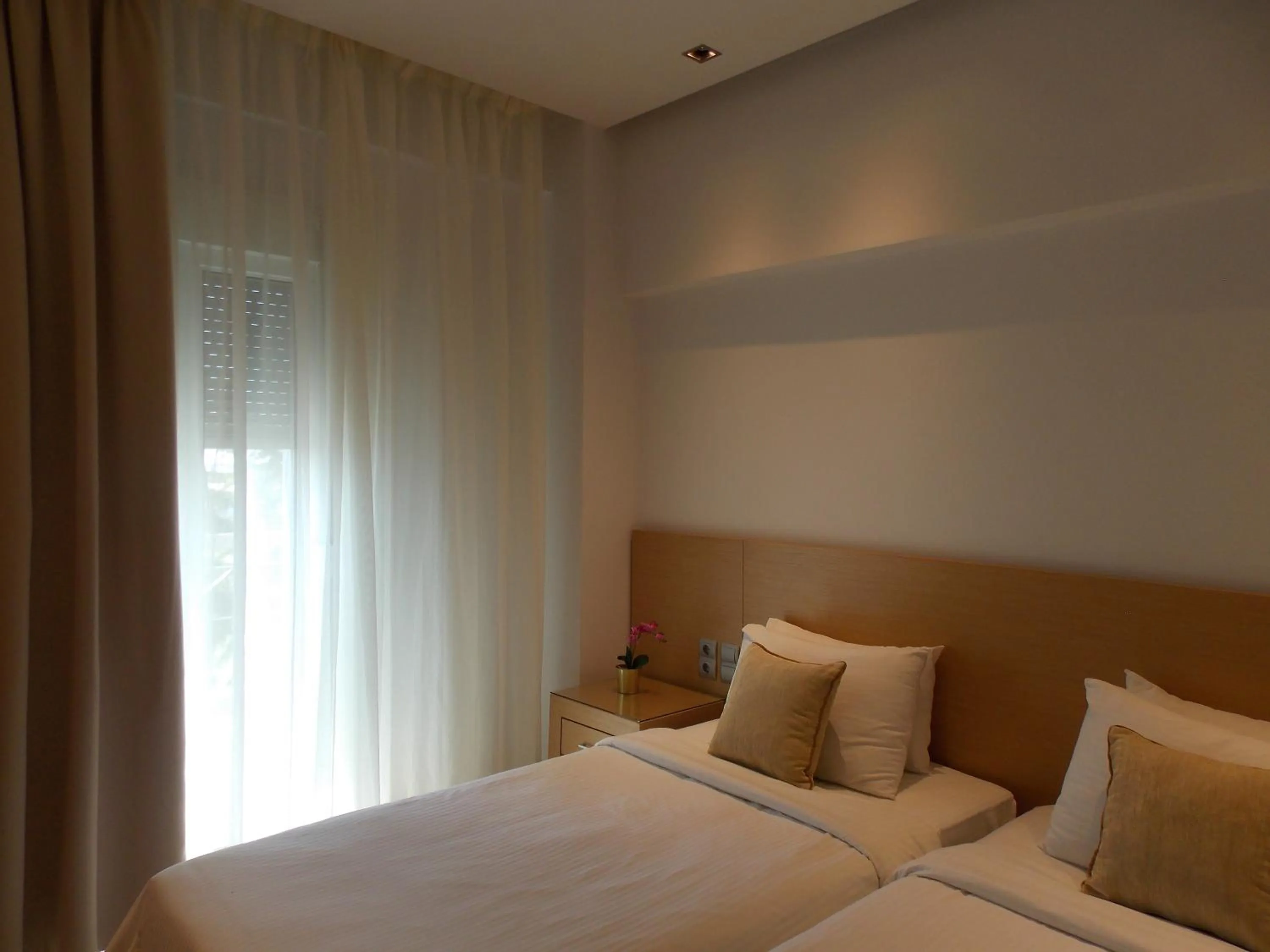 Bed in Hotel Alexandros