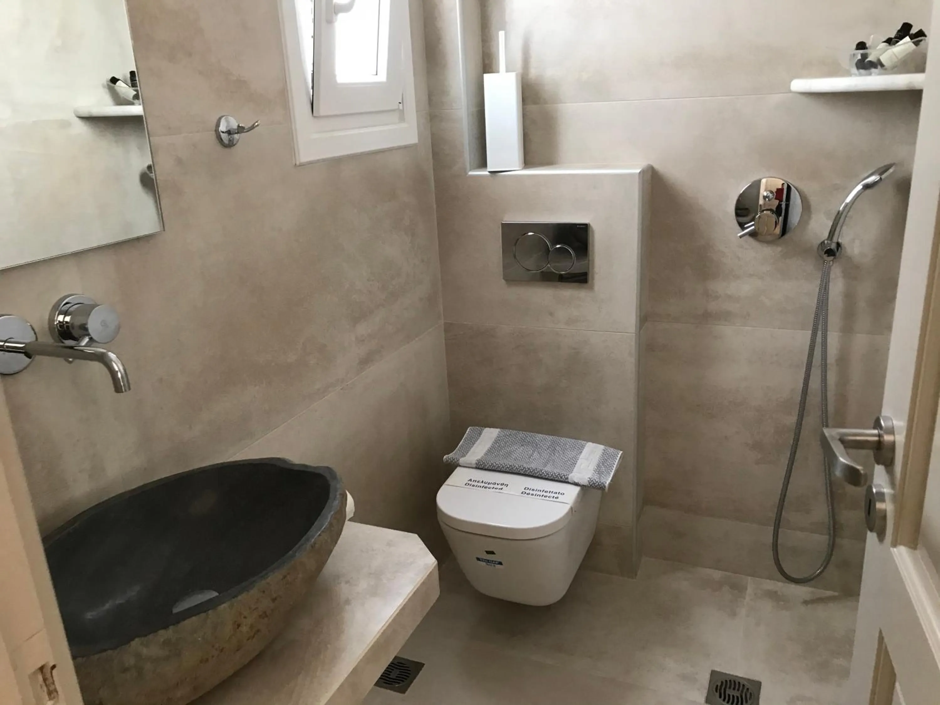 Bathroom in Vassiliki Rooms