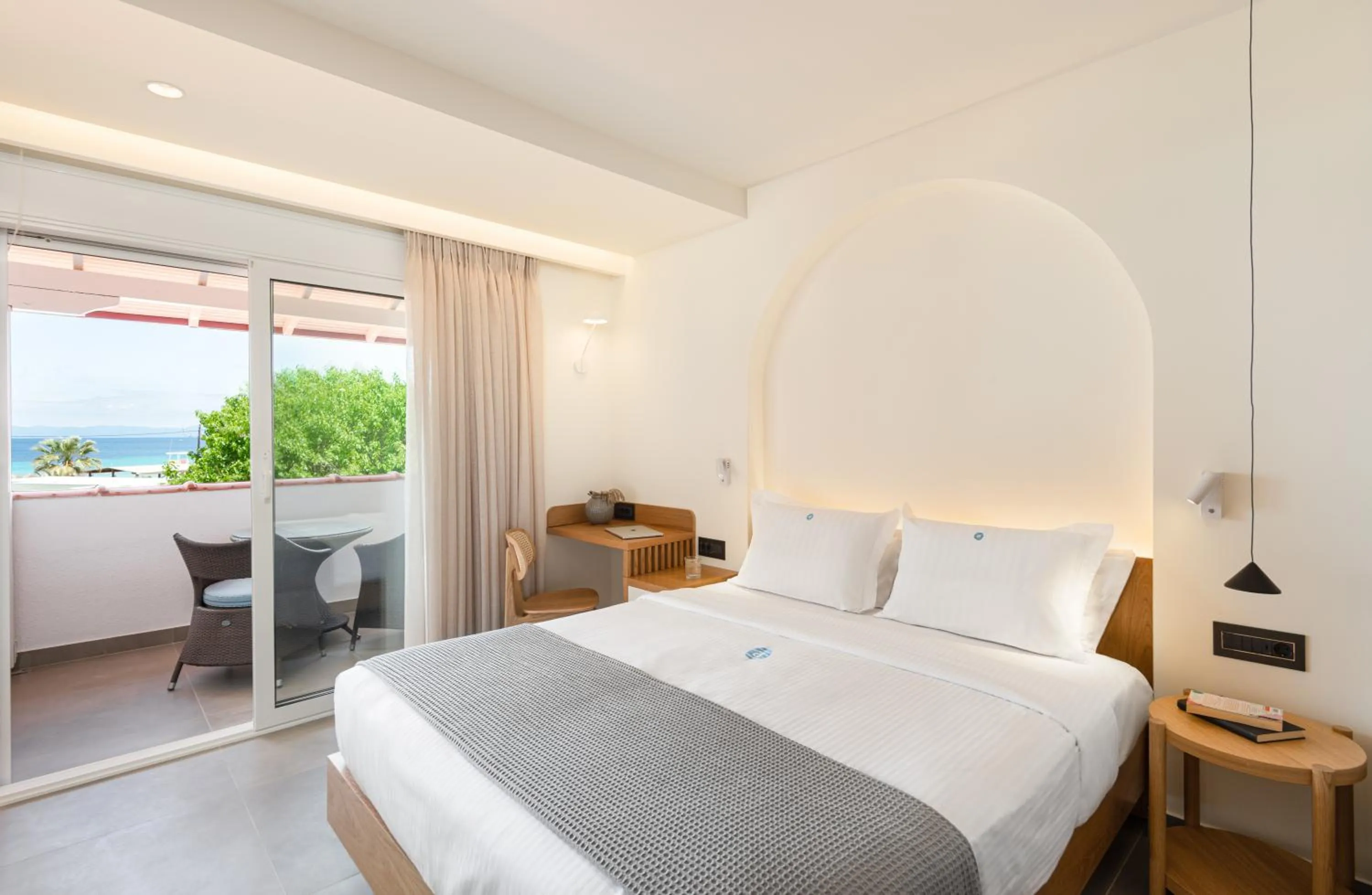 Bed in Antigoni Seaside Resort