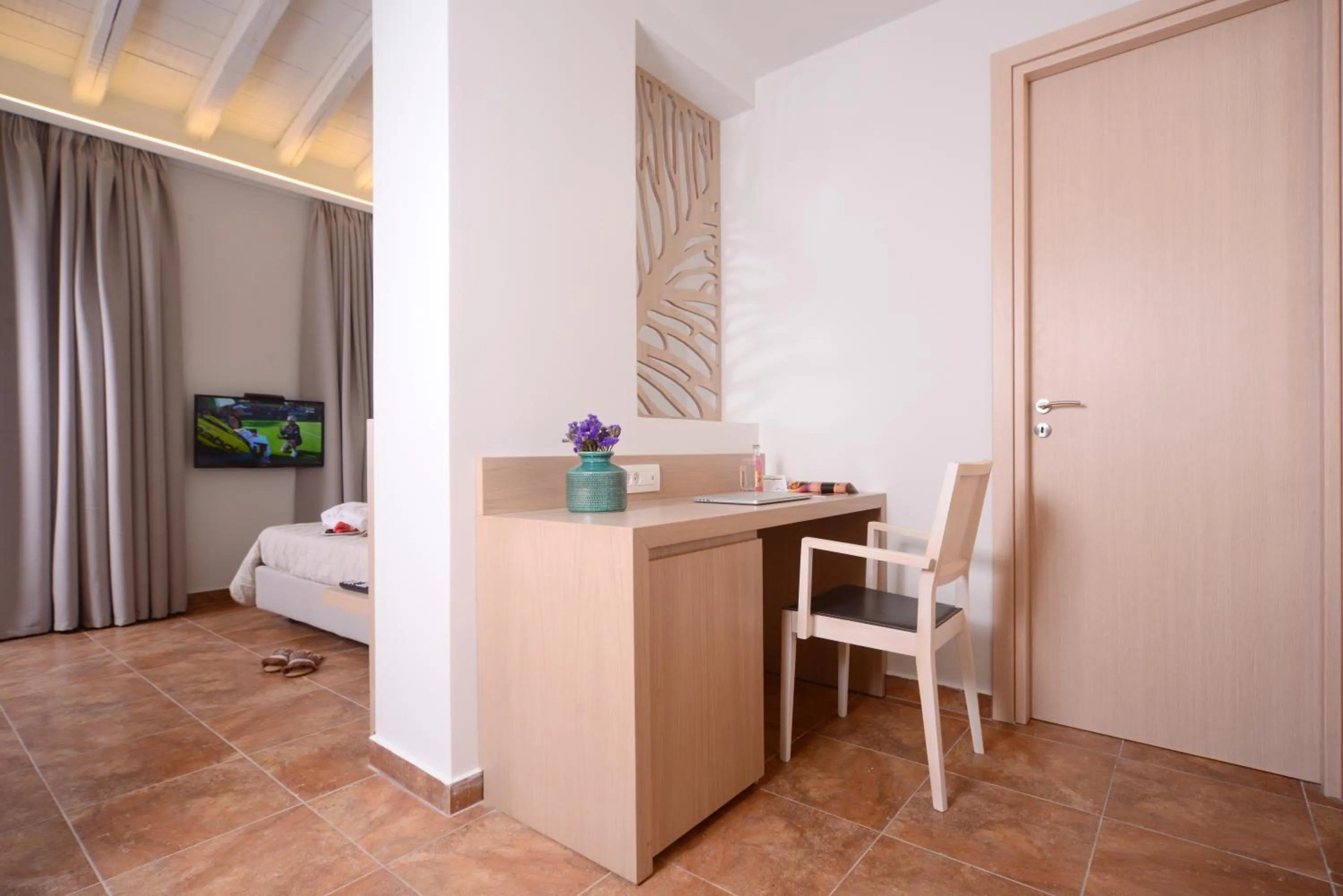 TV and multimedia in Varos Village Boutique Hotel