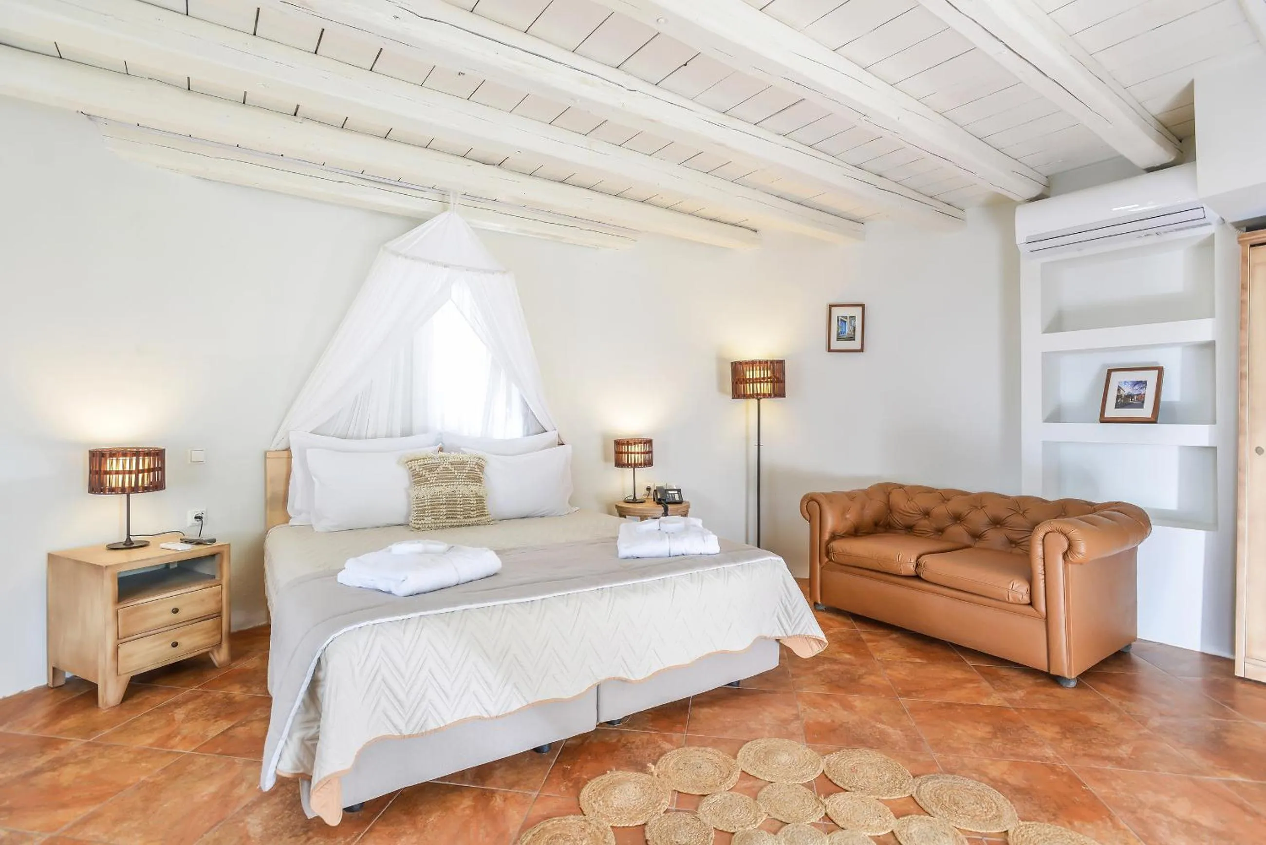 Bed in Varos Village Boutique Hotel