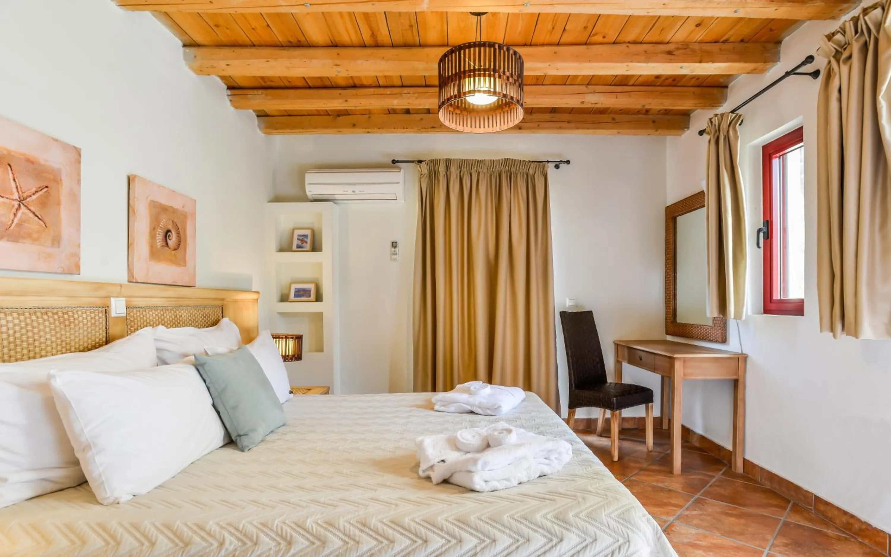 Bed in Varos Village Boutique Hotel