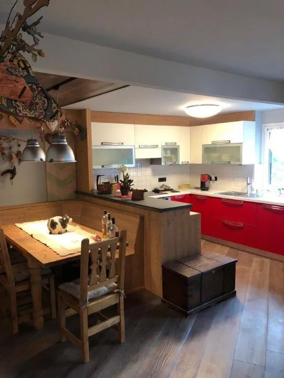 Kitchen or kitchenette in Aux Pieds du Roi - Suite & Spa