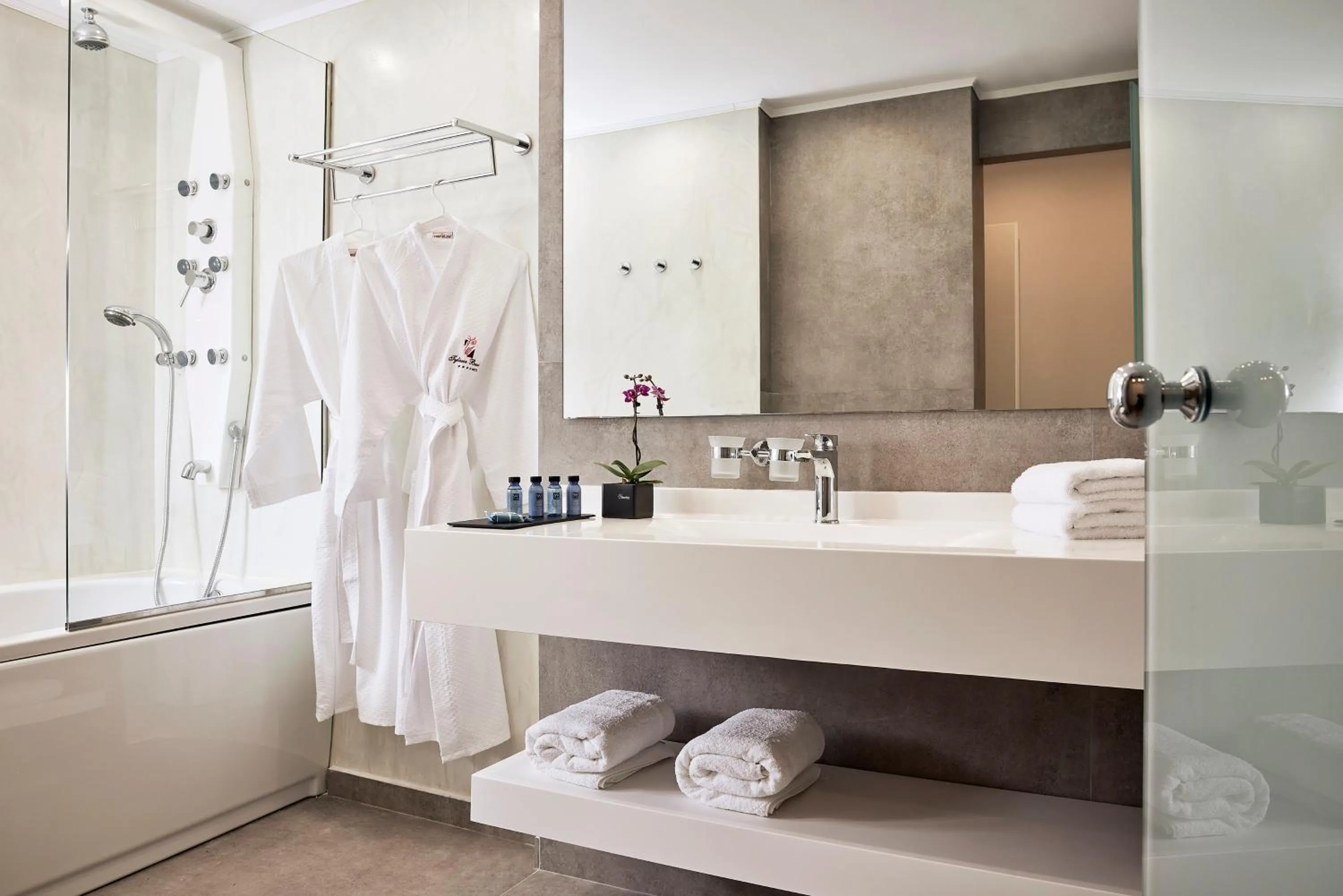 Bathroom, Bed in Tylissos Beach Hotel - Adults Only