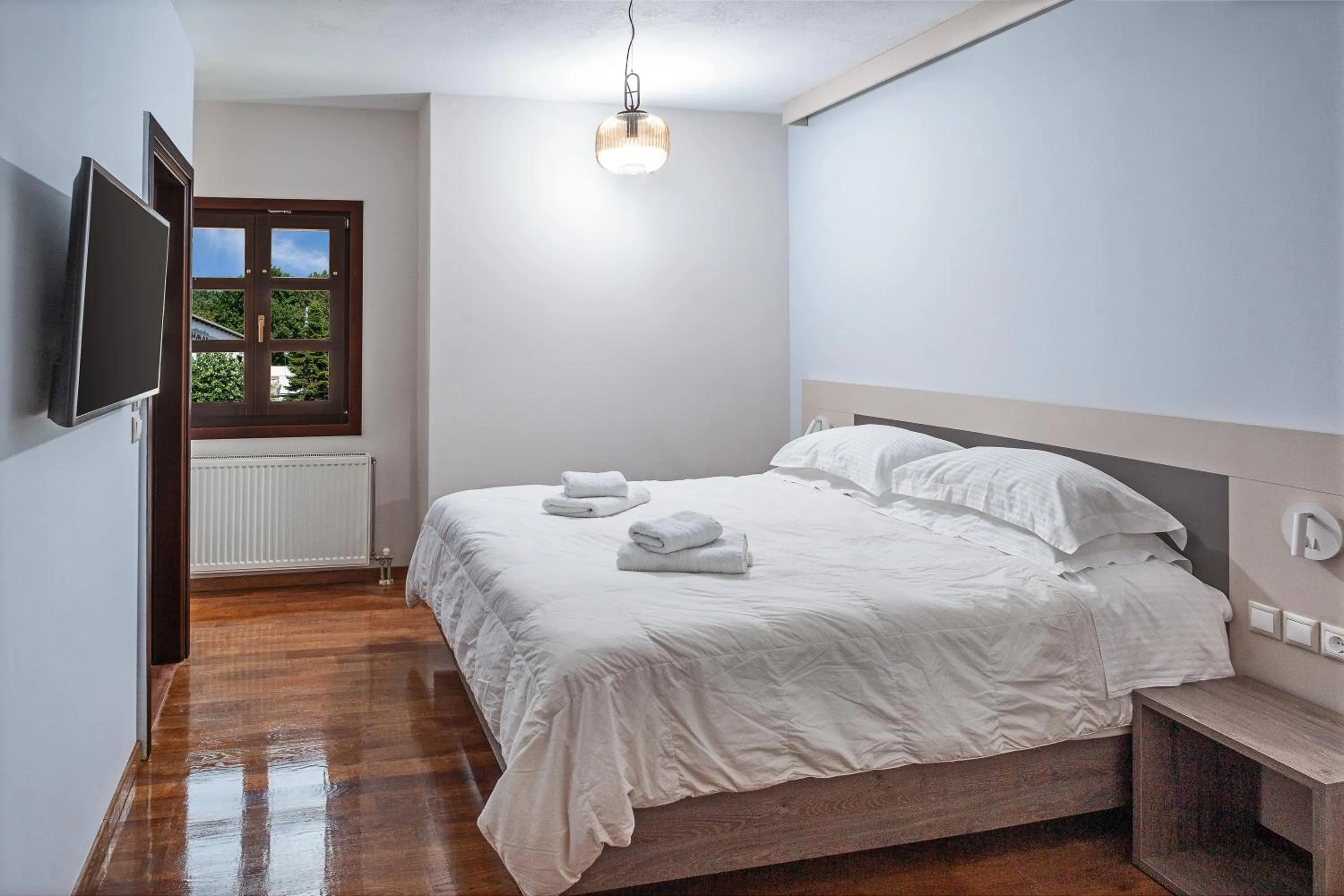 Bed in Erofili Hotel & Suites