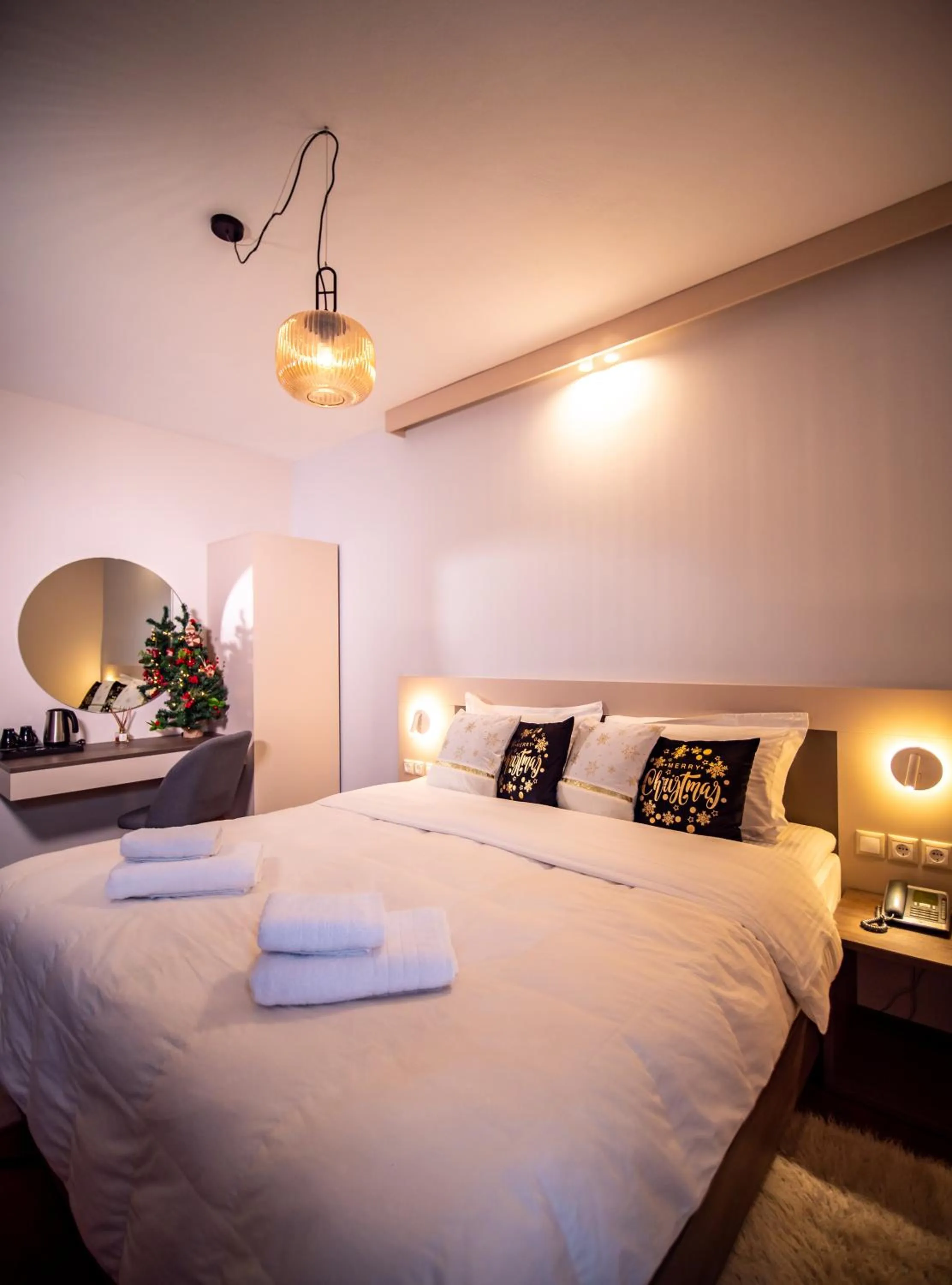 Bed in Erofili Hotel & Suites