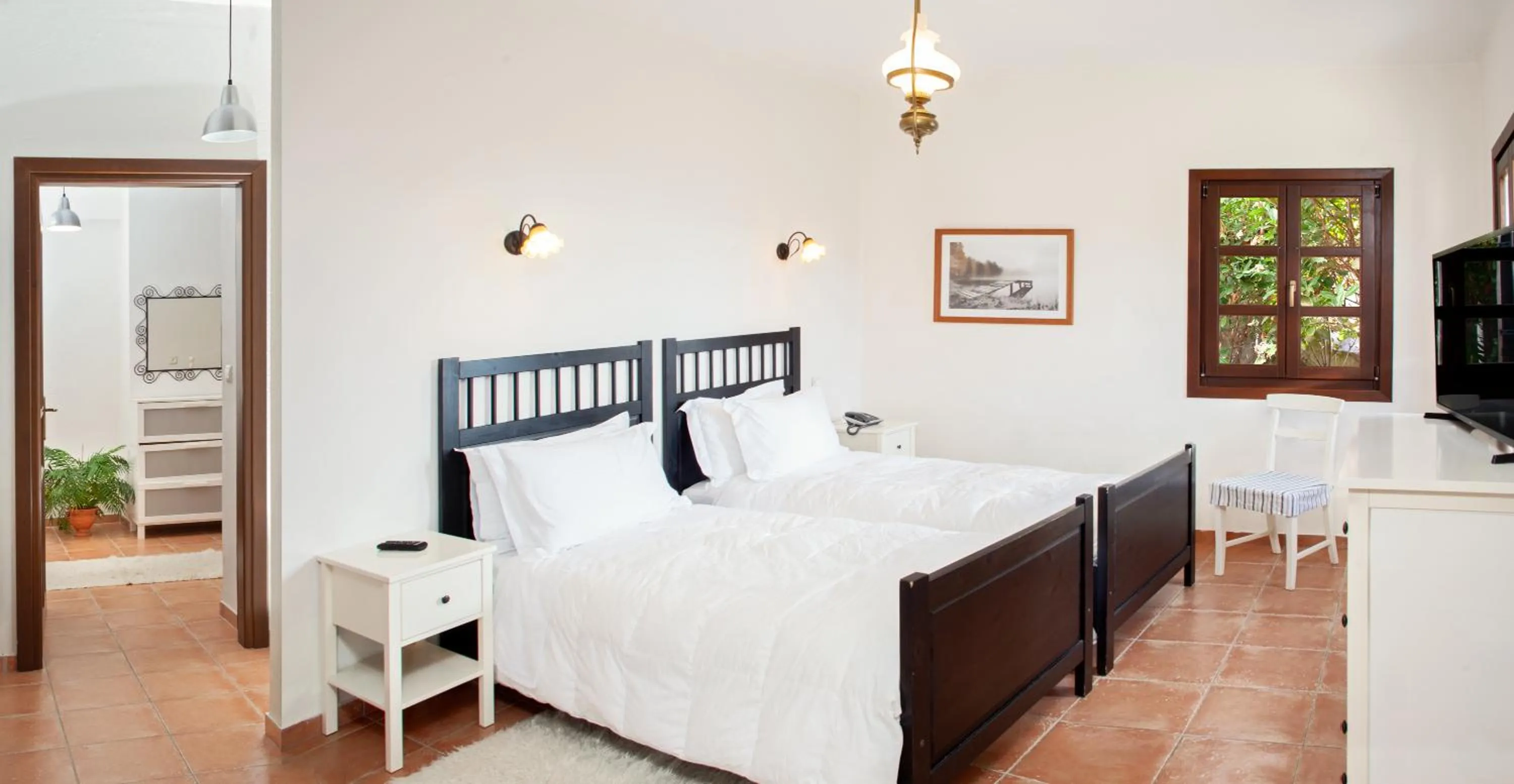 Photo of the whole room, Bed in Erofili Hotel & Suites