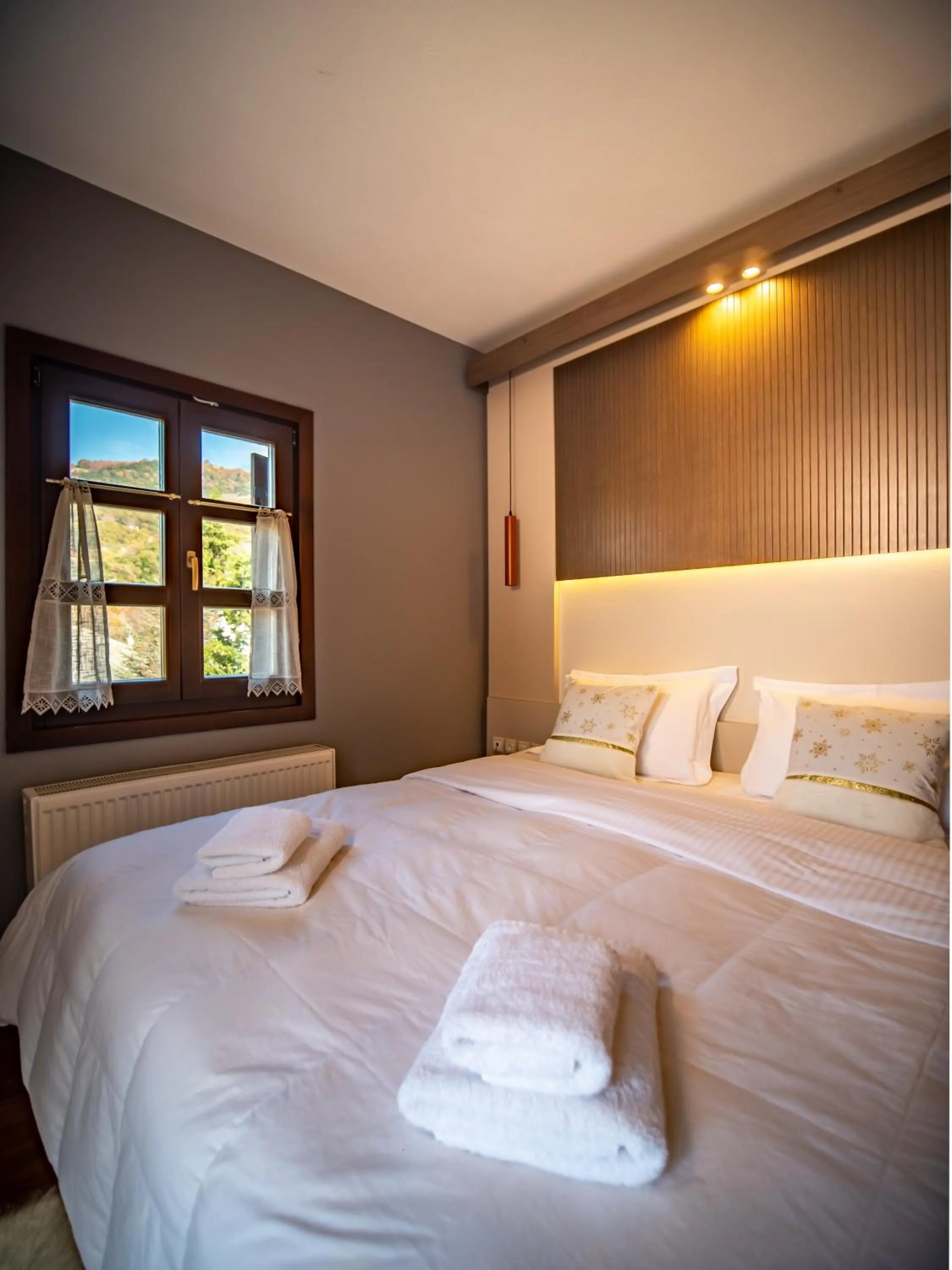 Bed in Erofili Hotel & Suites