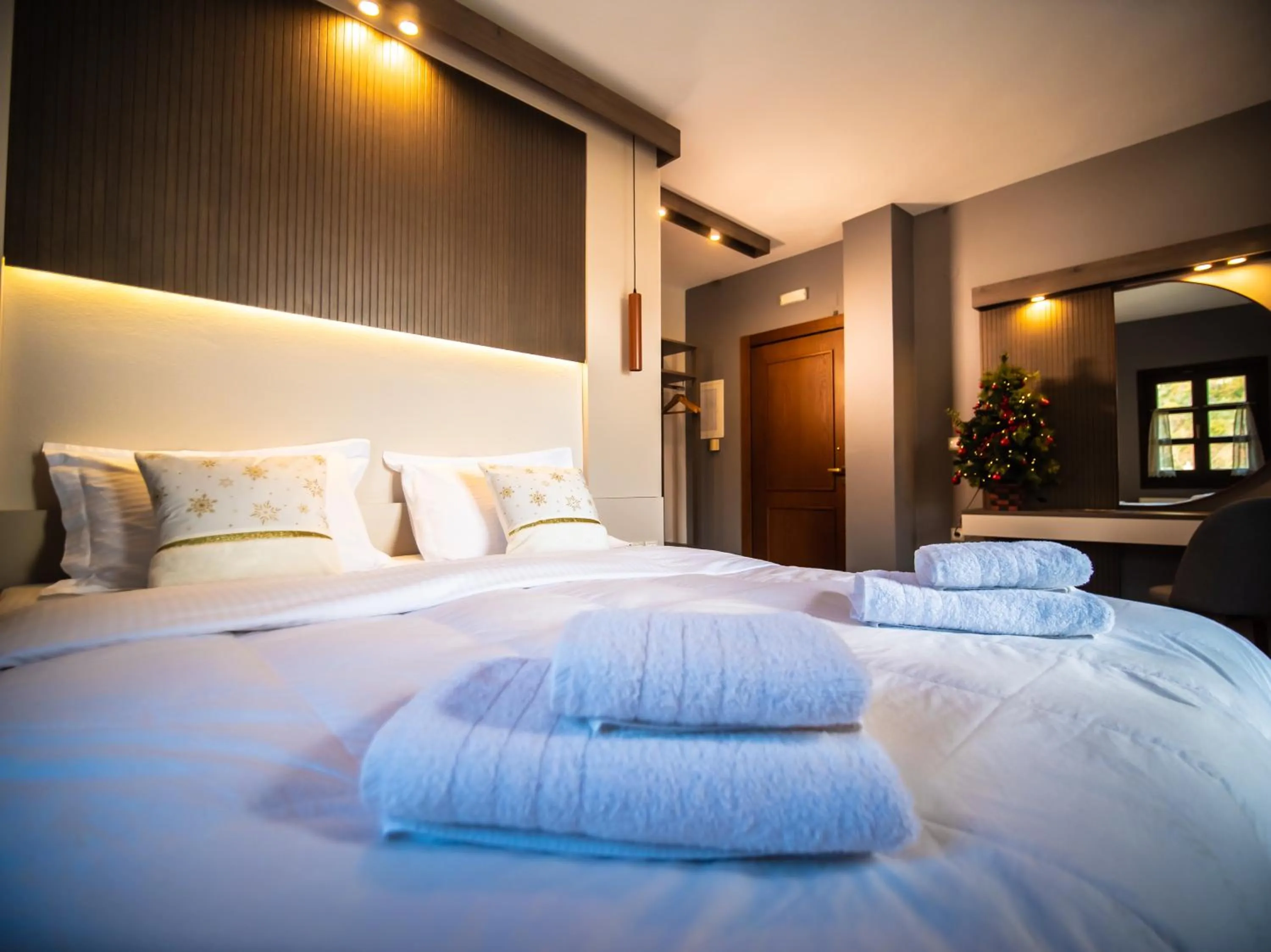 Bed in Erofili Hotel & Suites