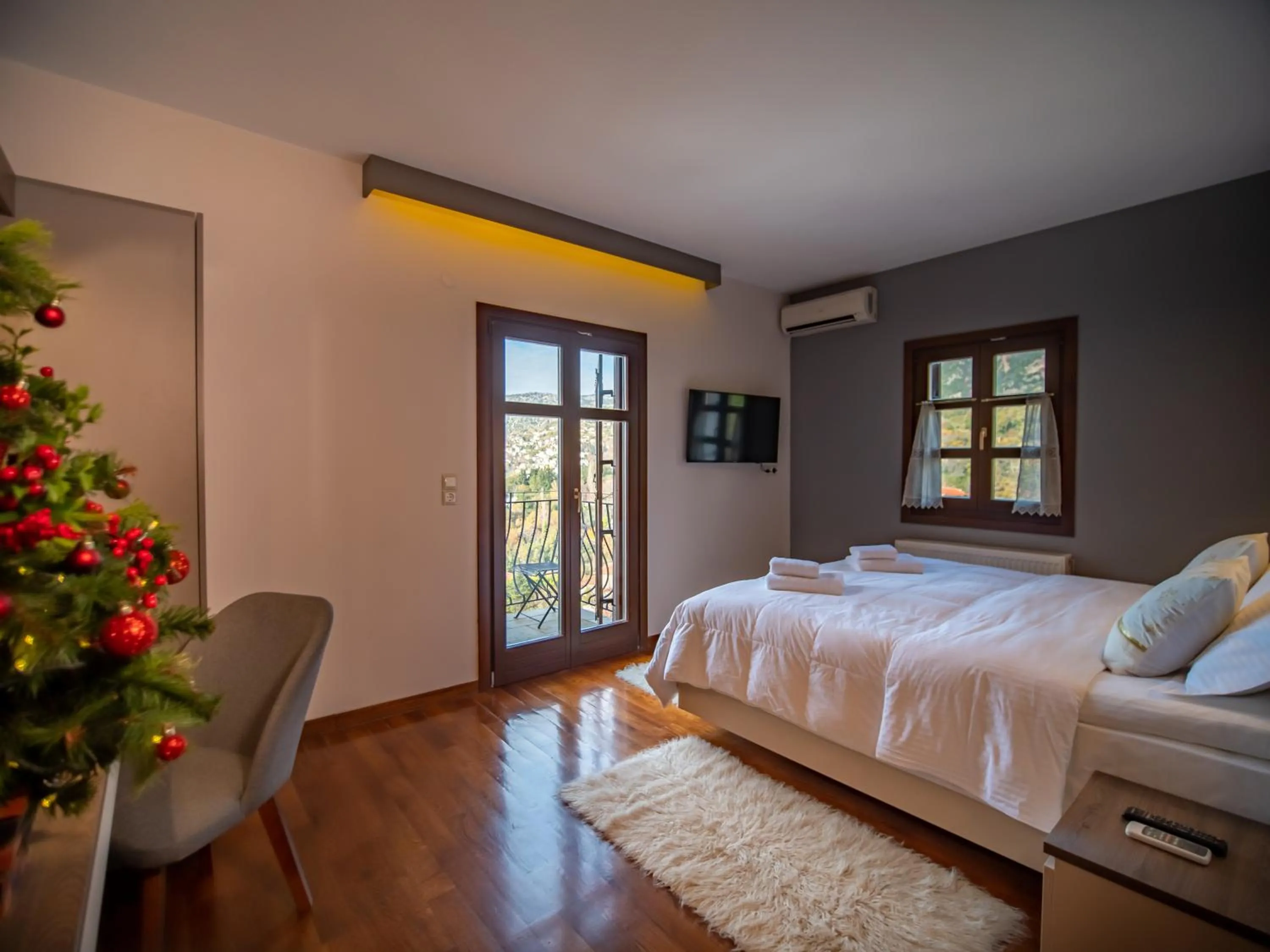 Bed in Erofili Hotel & Suites