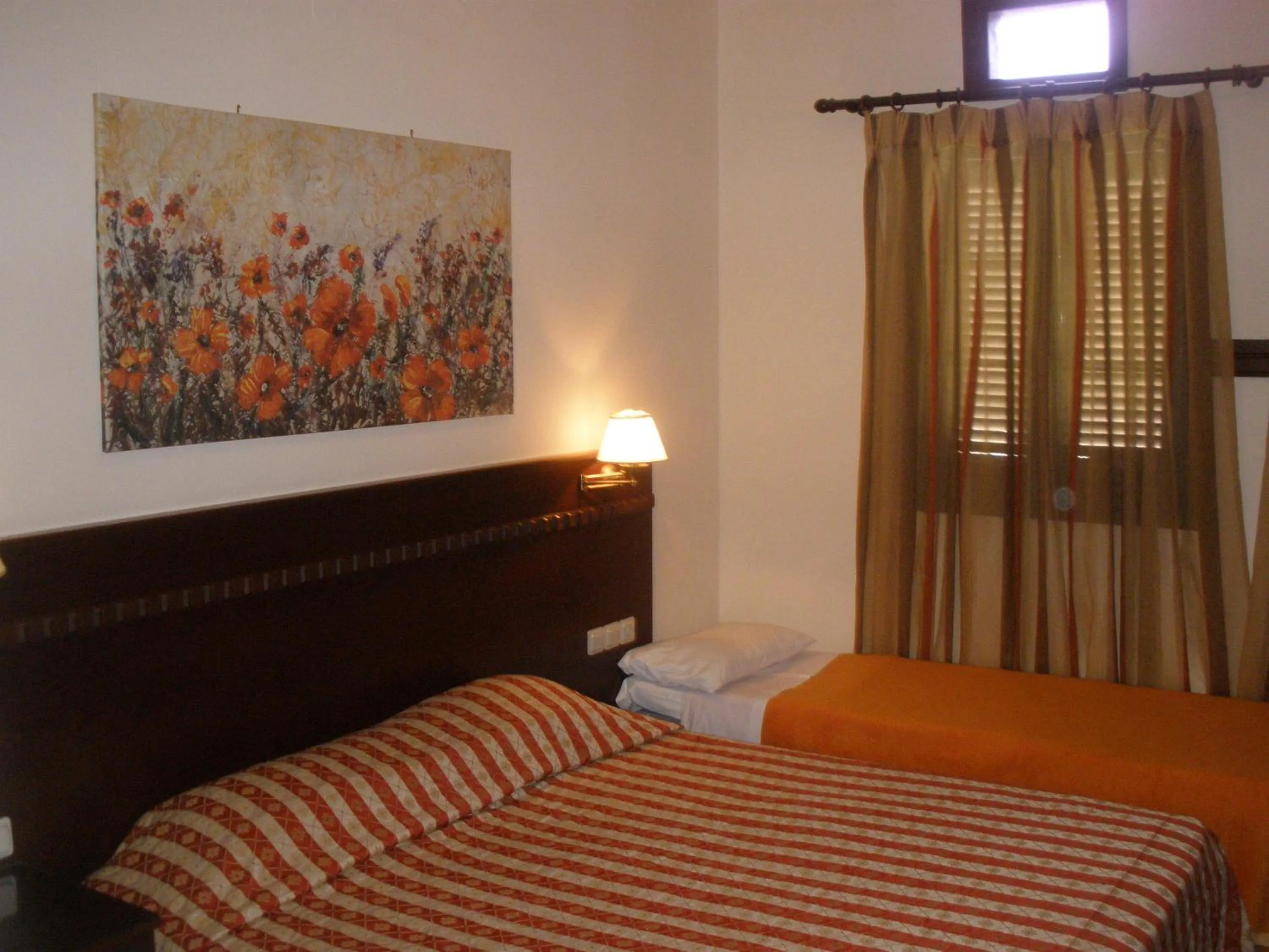 Bed in Pelias Hotel