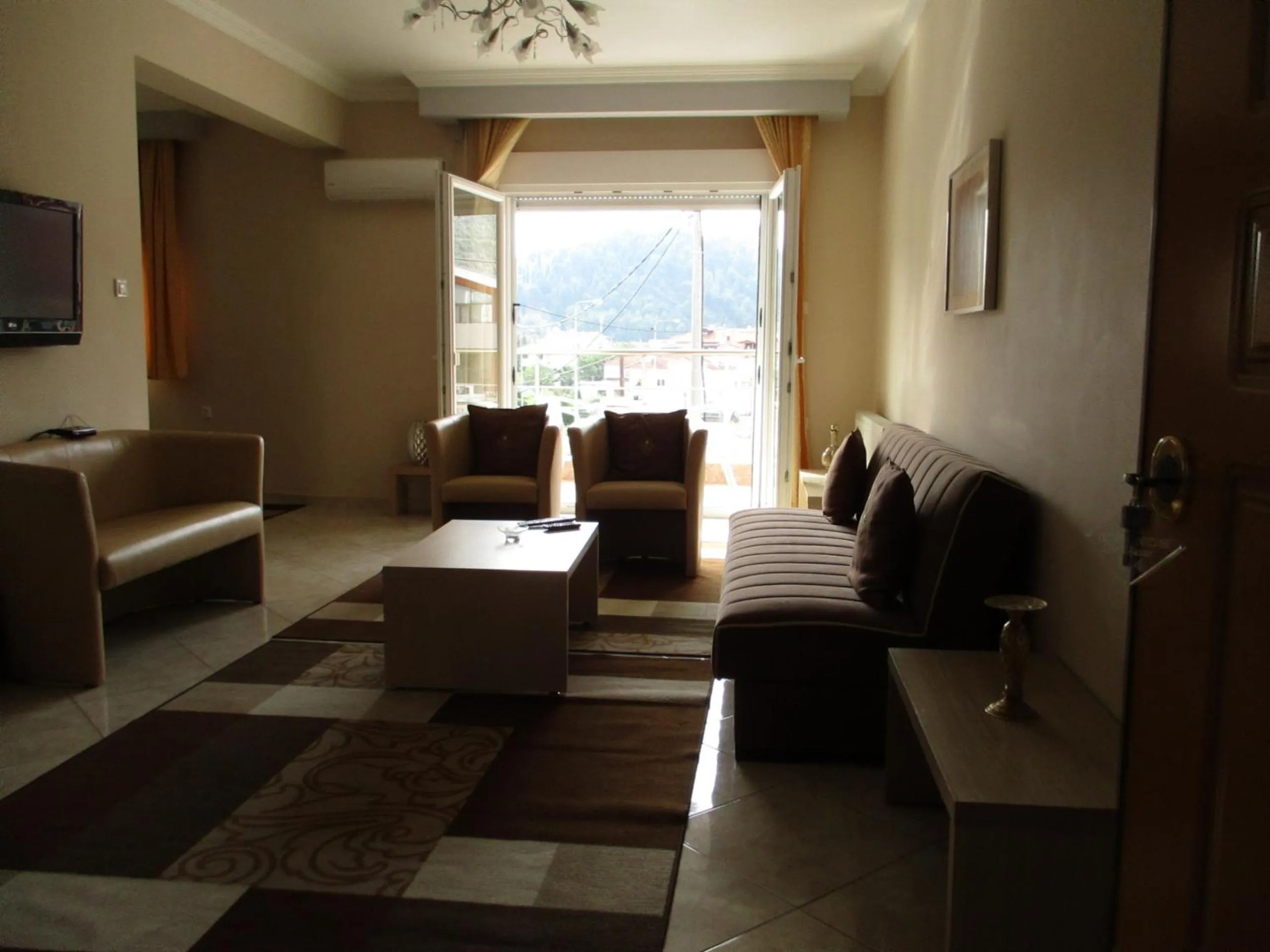 Seating area in Kyknos De Luxe Suites & Rooms