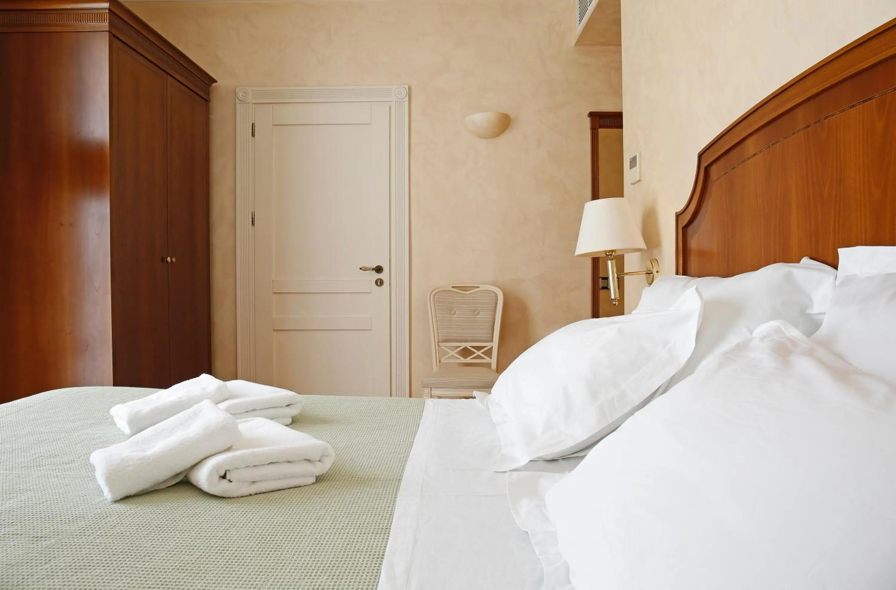 Bed in Siora Vittoria Boutique Hotel