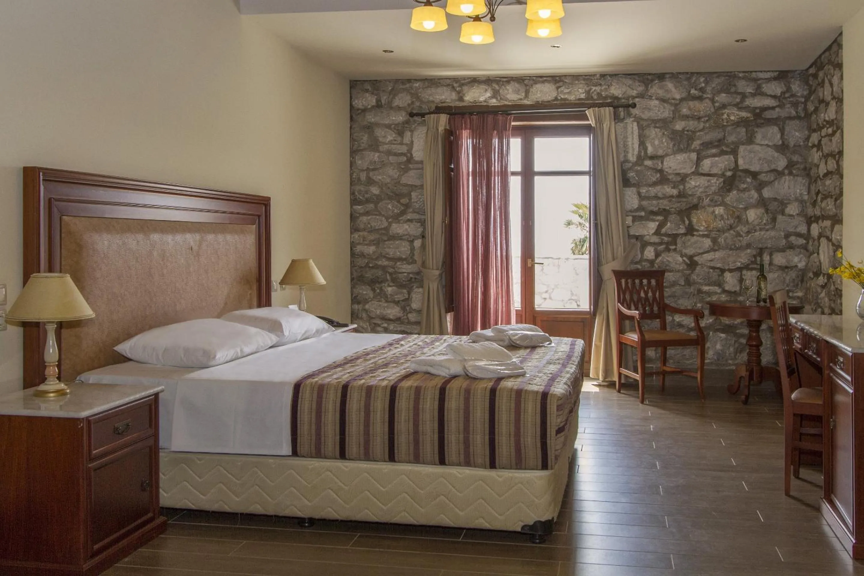 Bed in Itilo Traditional Hotel