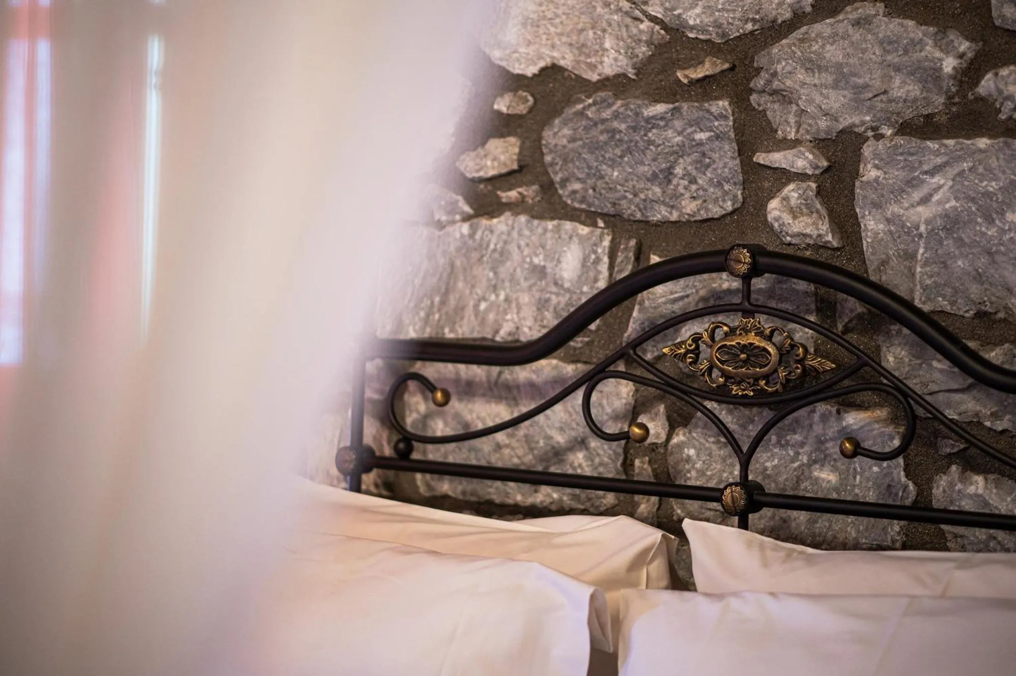 Decorative detail, Bed in Itilo Traditional Hotel