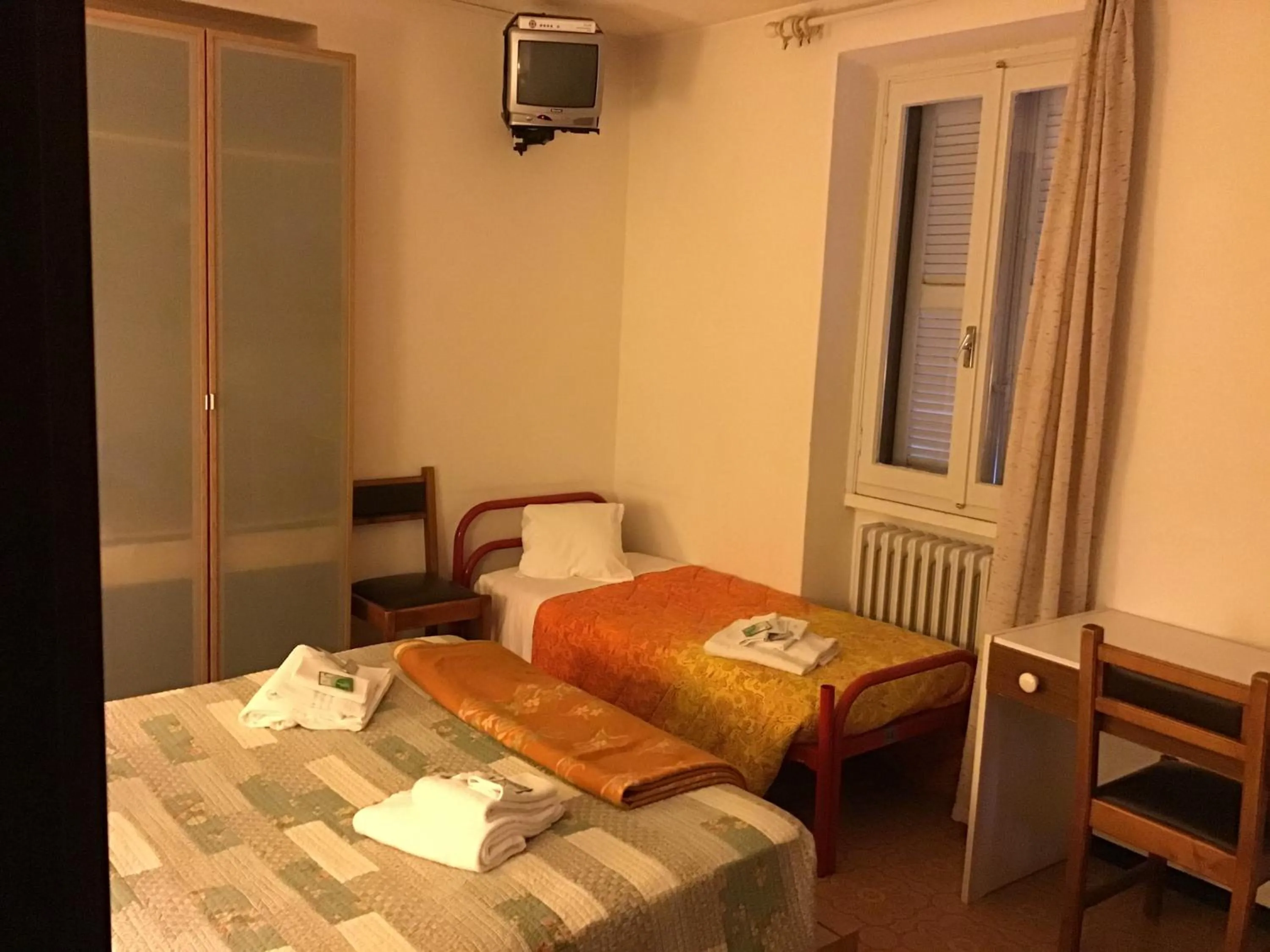 Bed in Hotel Mirabeau