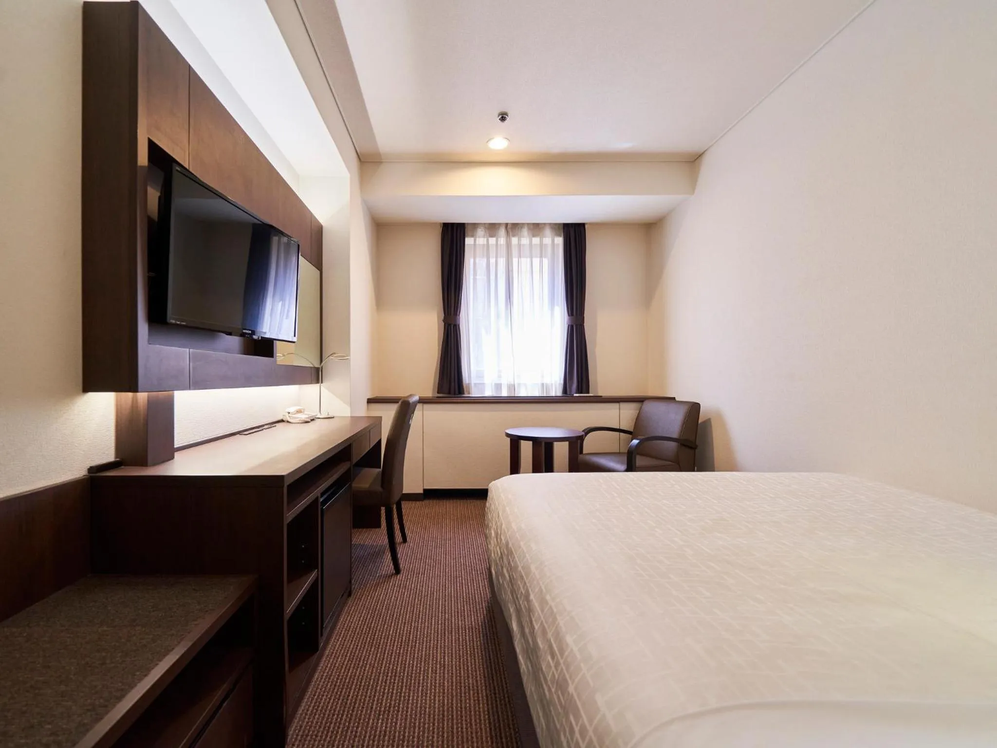 Bed in Princess Garden Hotel