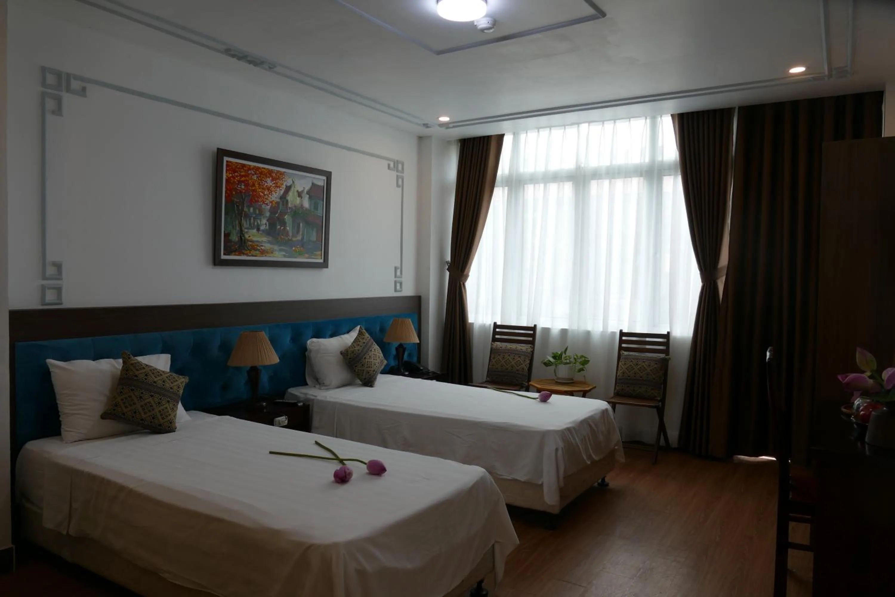 Bed in Maison d'Hanoi Hotel