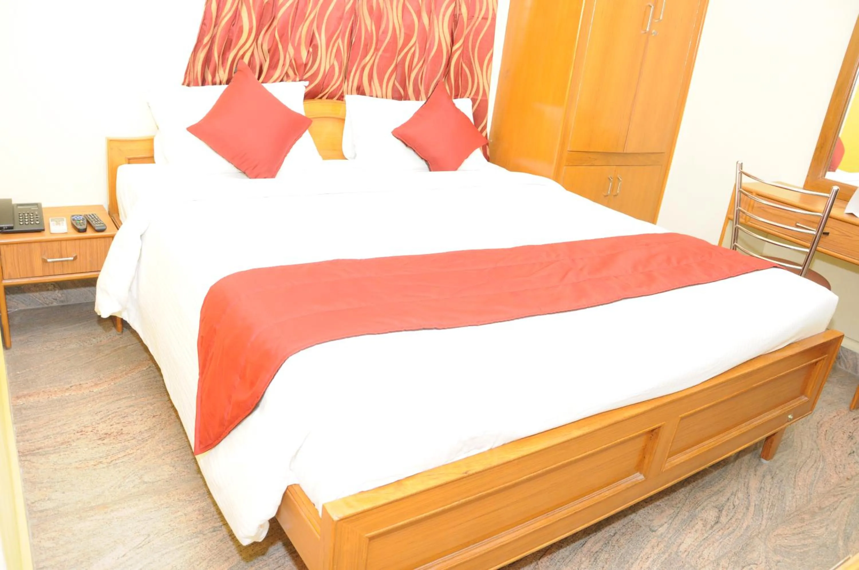 Bed in Green Grande Inn