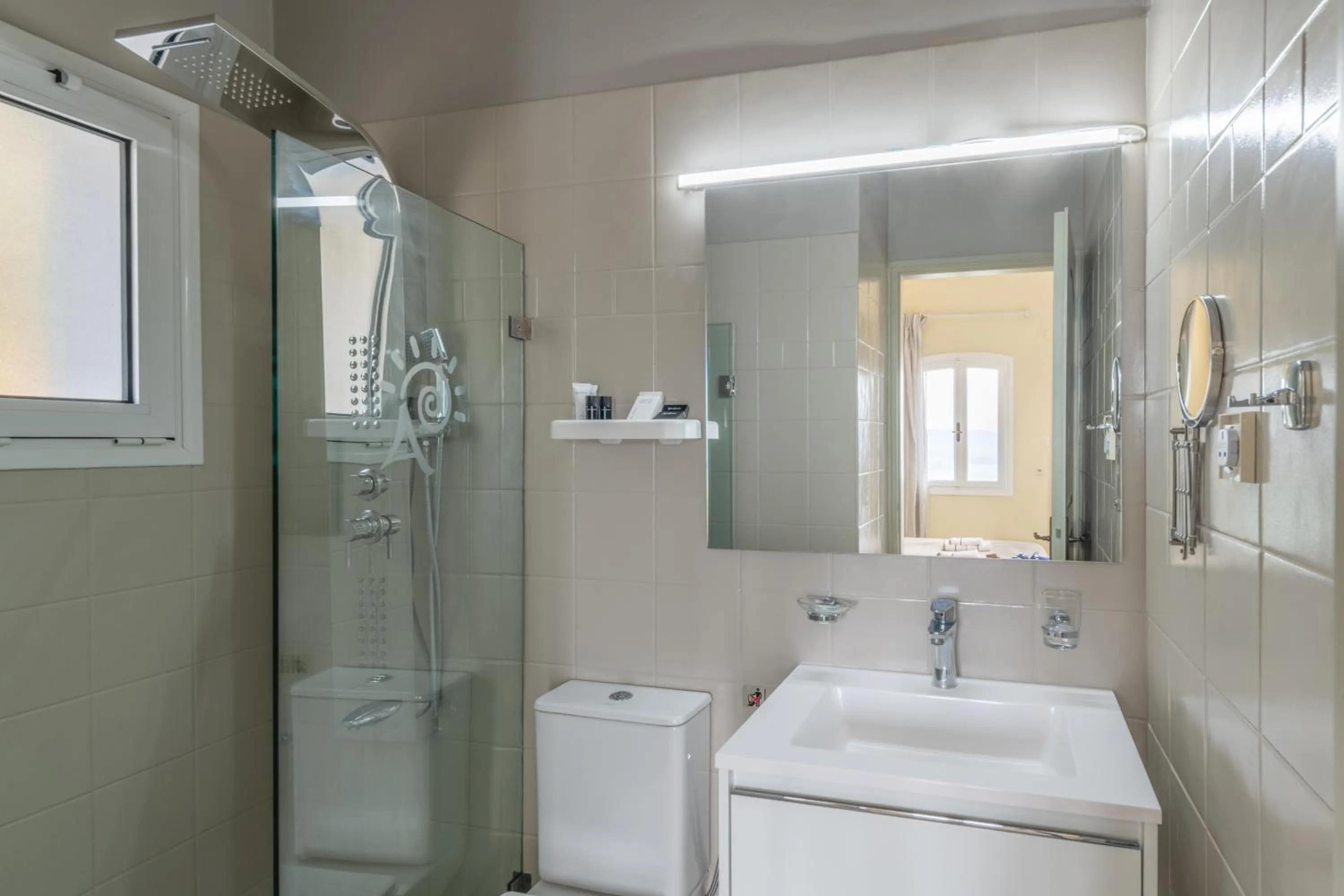 Bathroom in Adrakos Apartments (Adults Only)