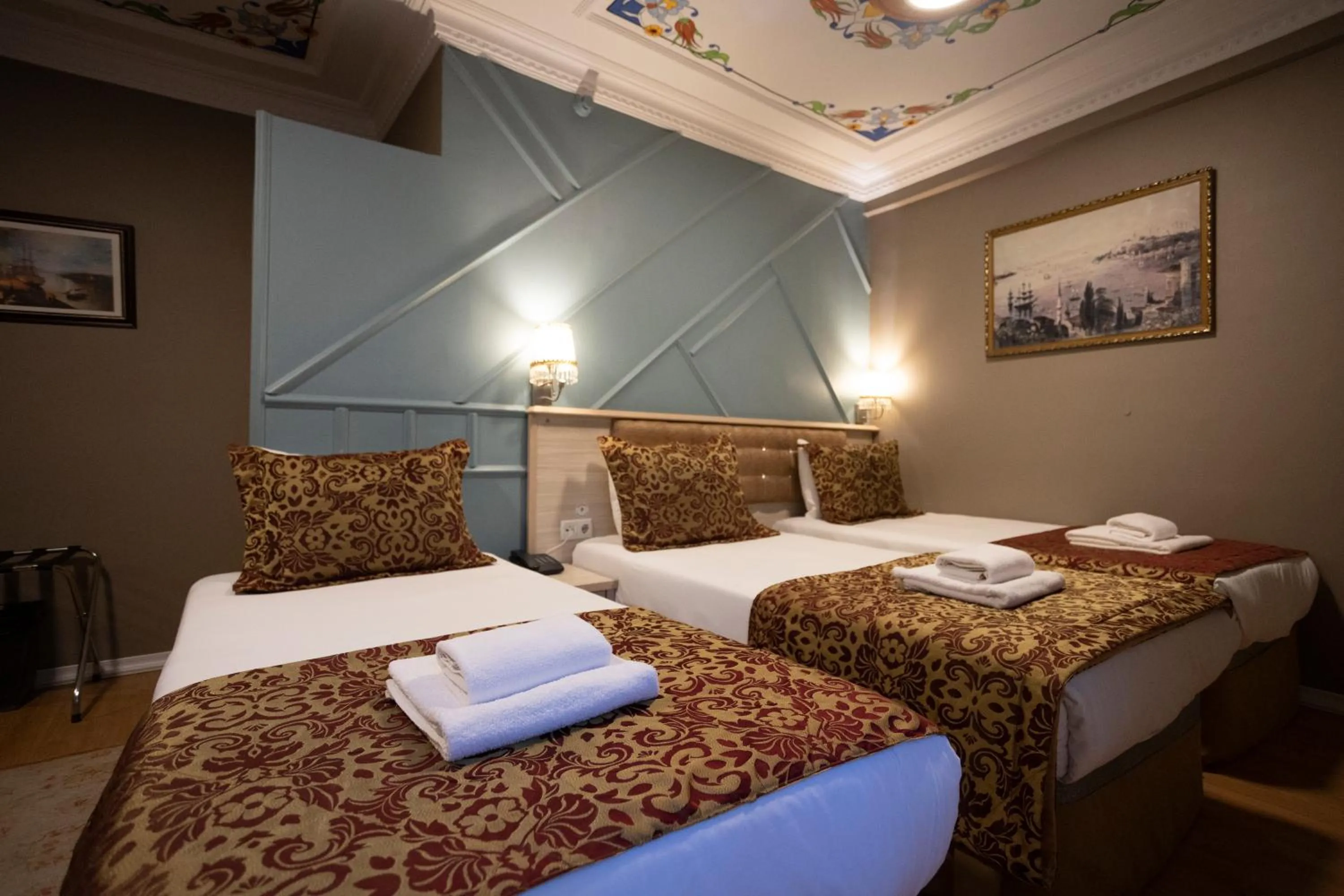 Bed in Tashkonak Studio Suites