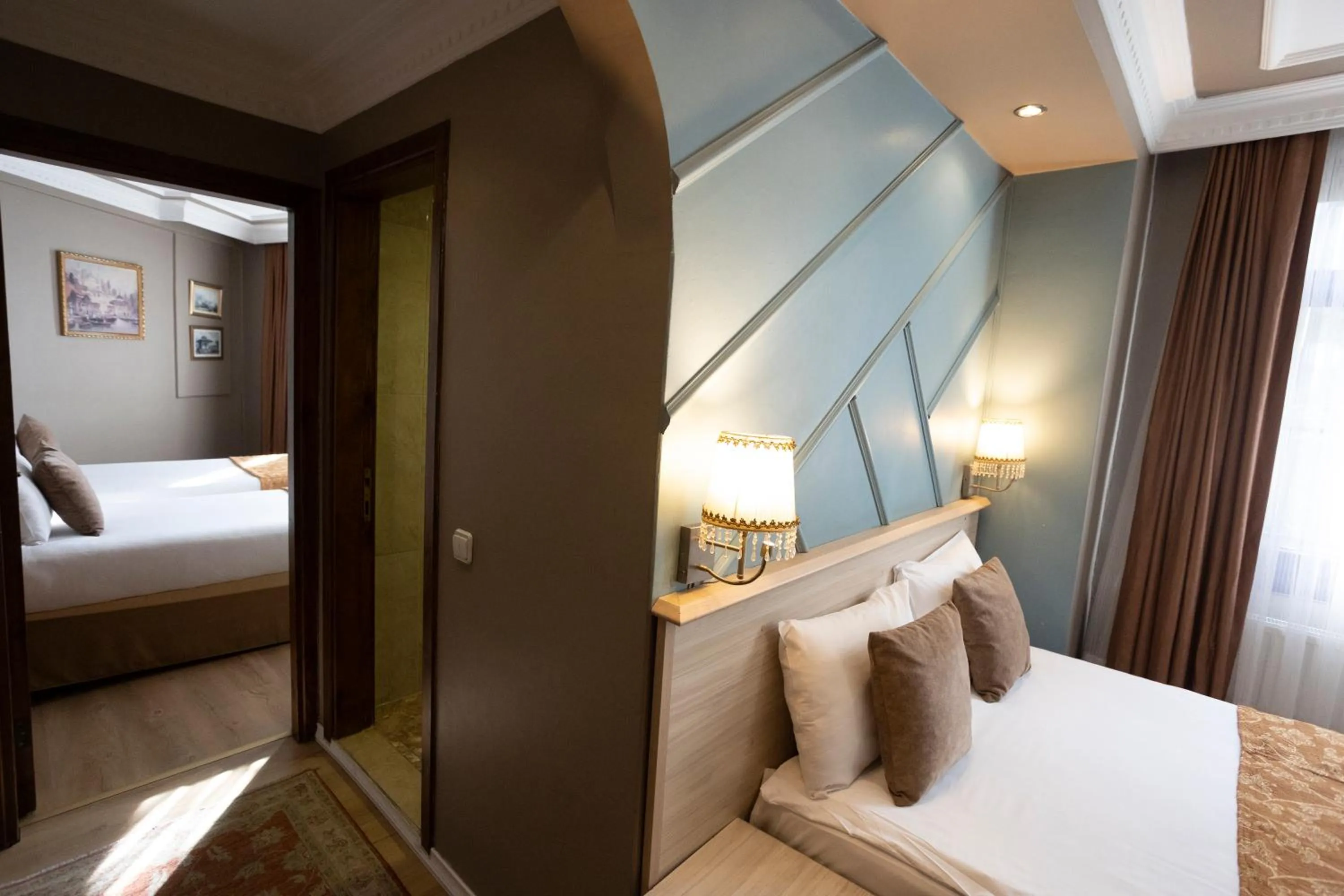 Bed in Tashkonak Studio Suites