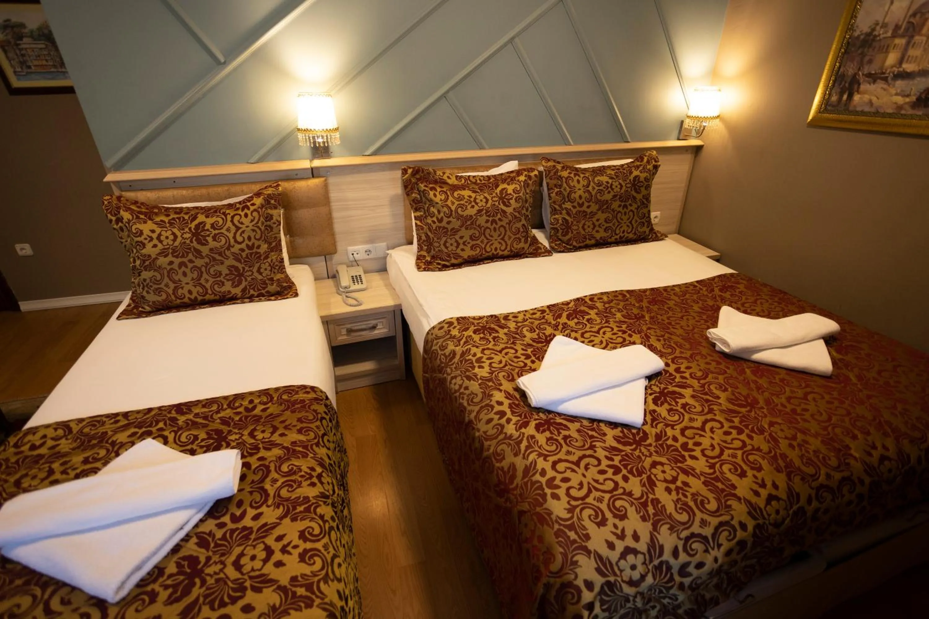 Bed in Tashkonak Studio Suites