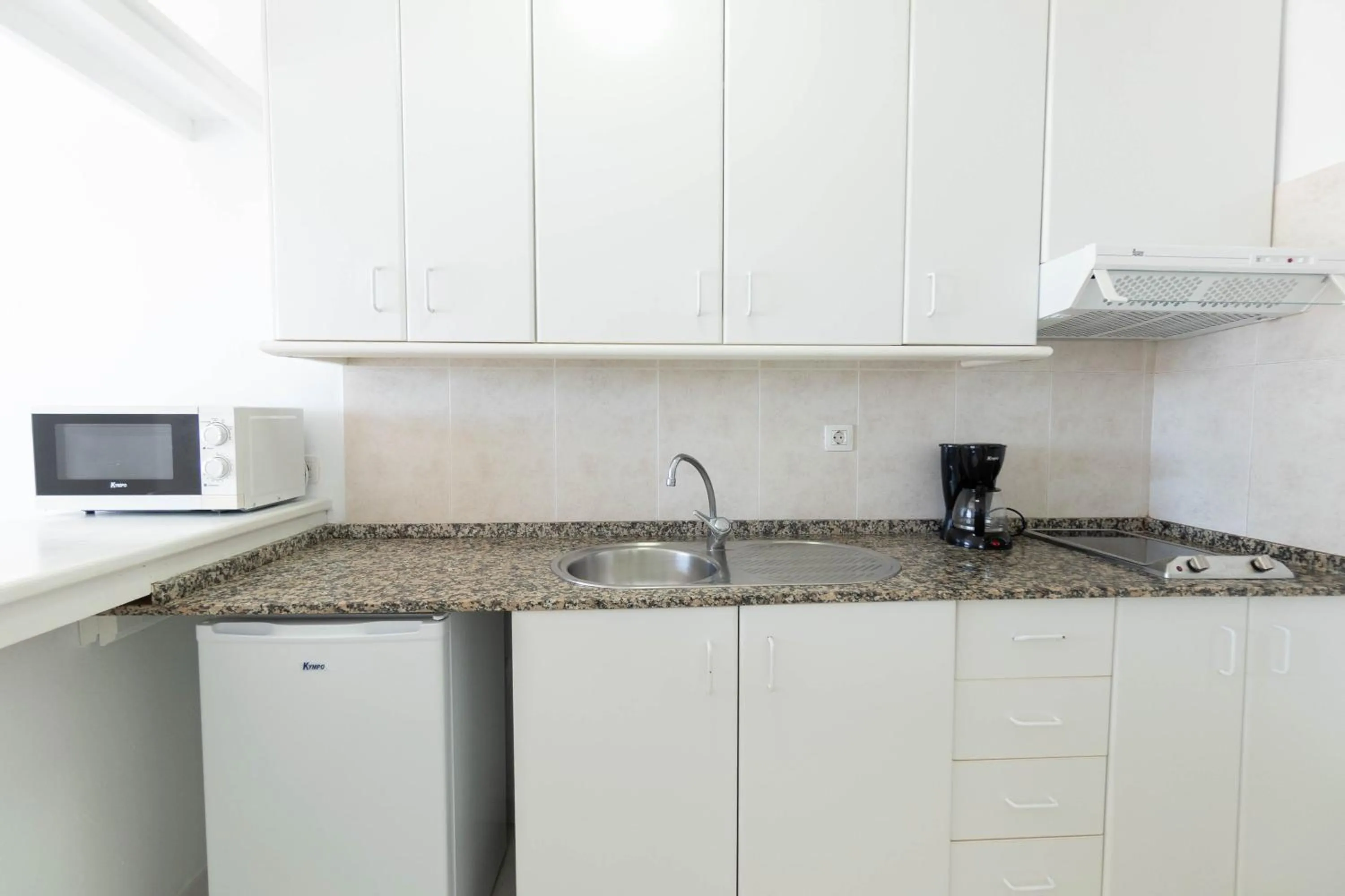 Kitchen or kitchenette in Apartamentos Flamingo