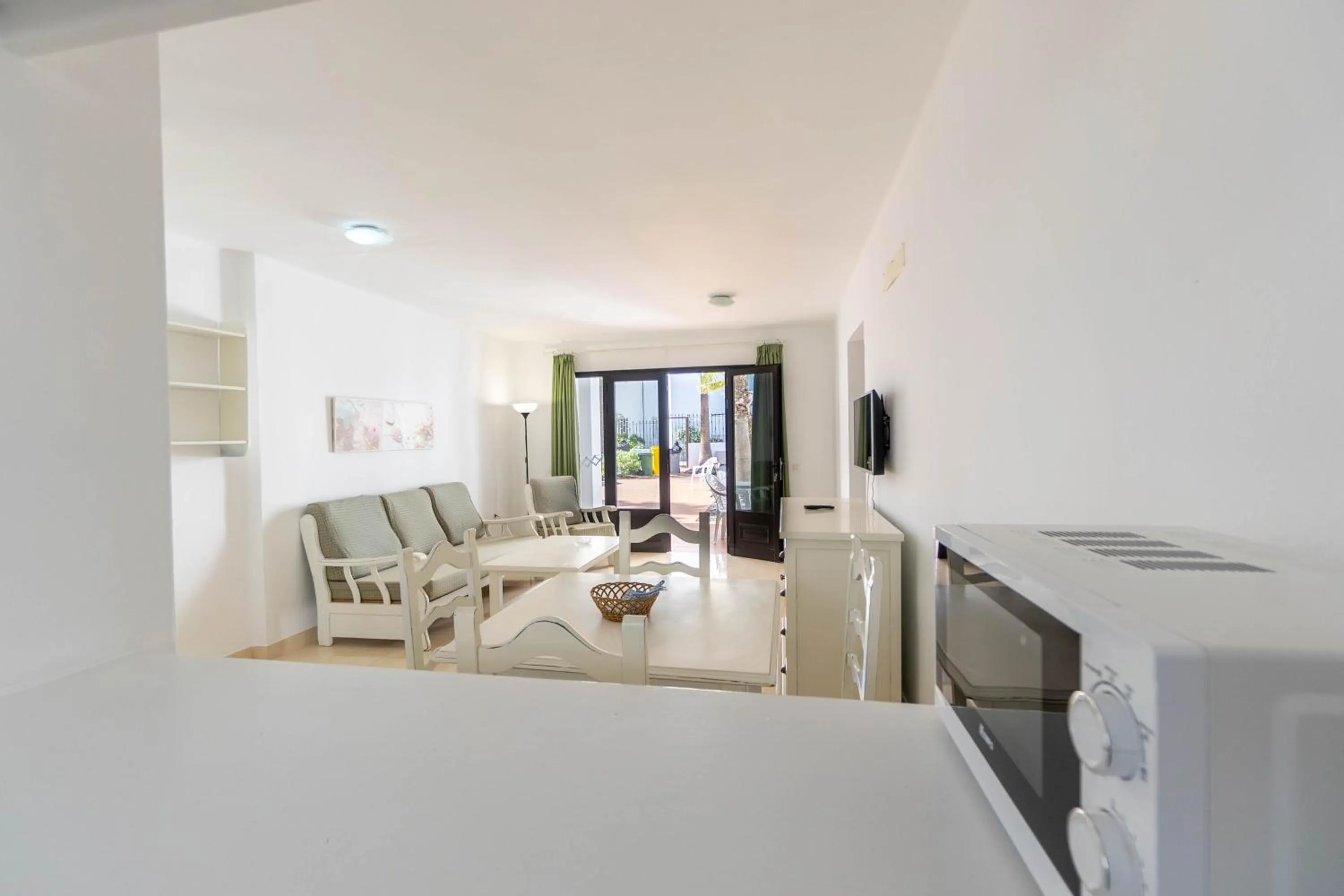 Photo of the whole room in Apartamentos Flamingo