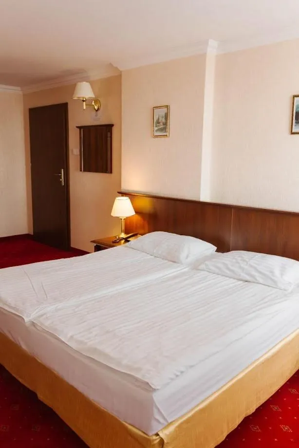 Bed in Hotel Jakub Sobieski