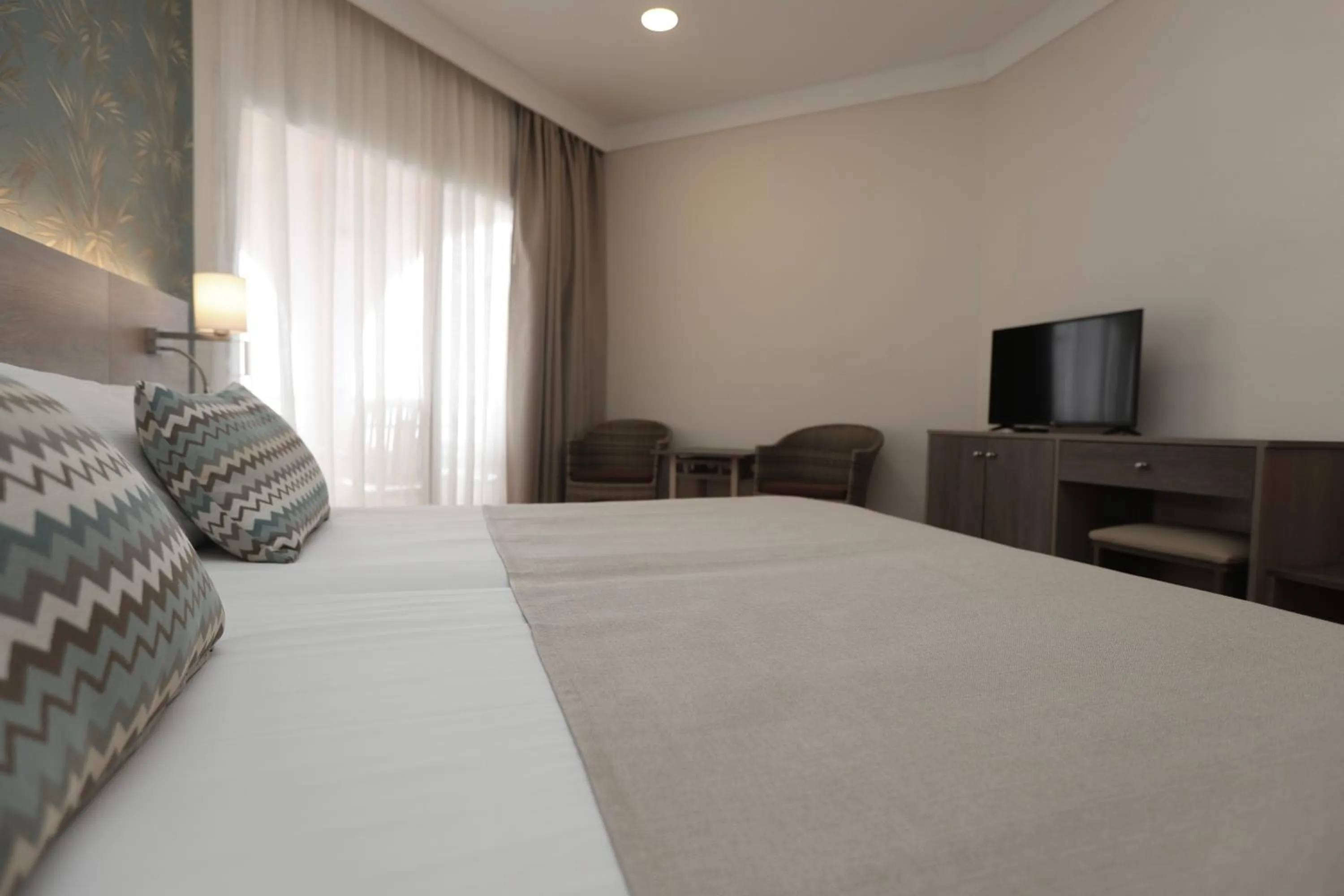 Bed in Hotel Puerto Palace