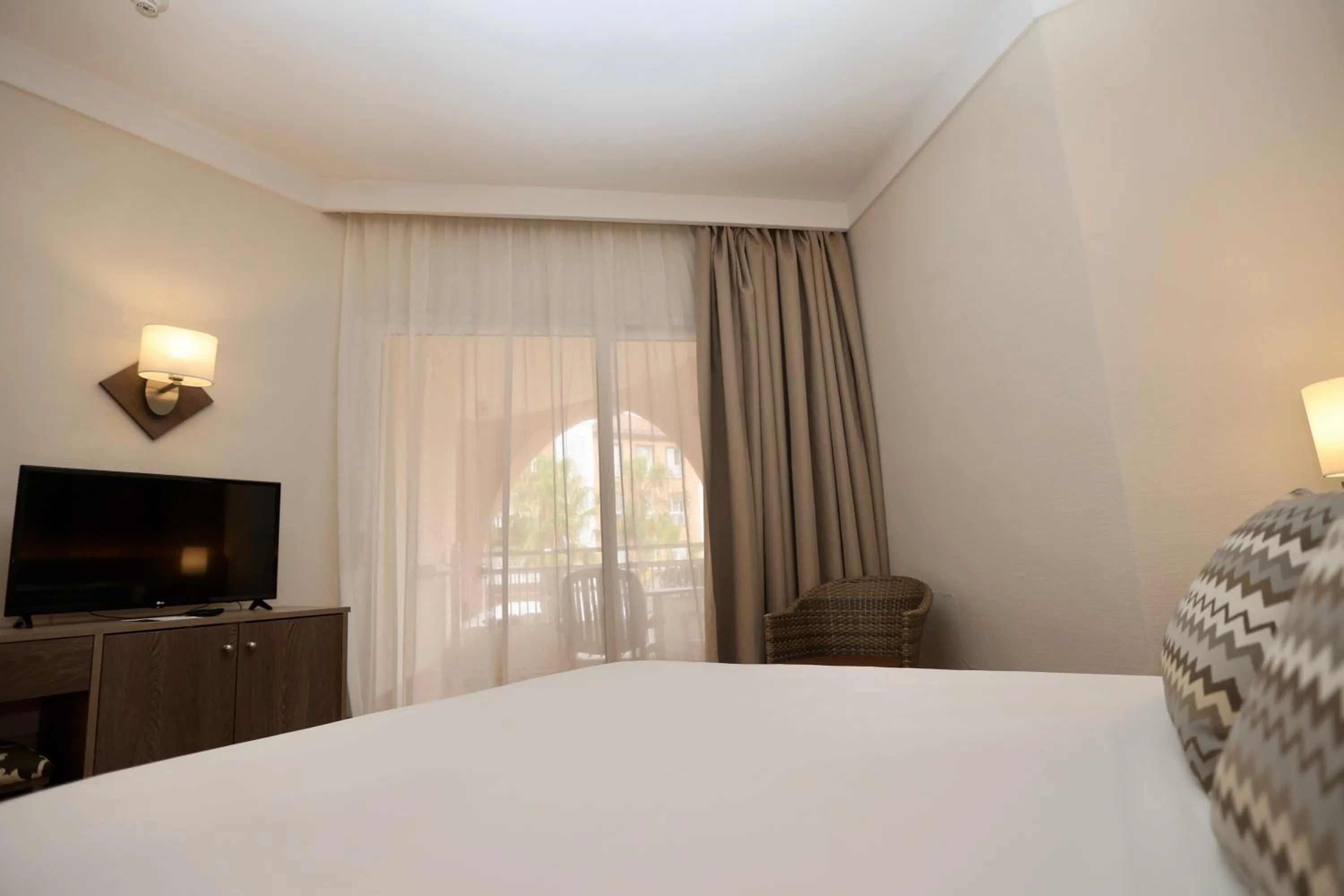 Bed in Hotel Puerto Palace