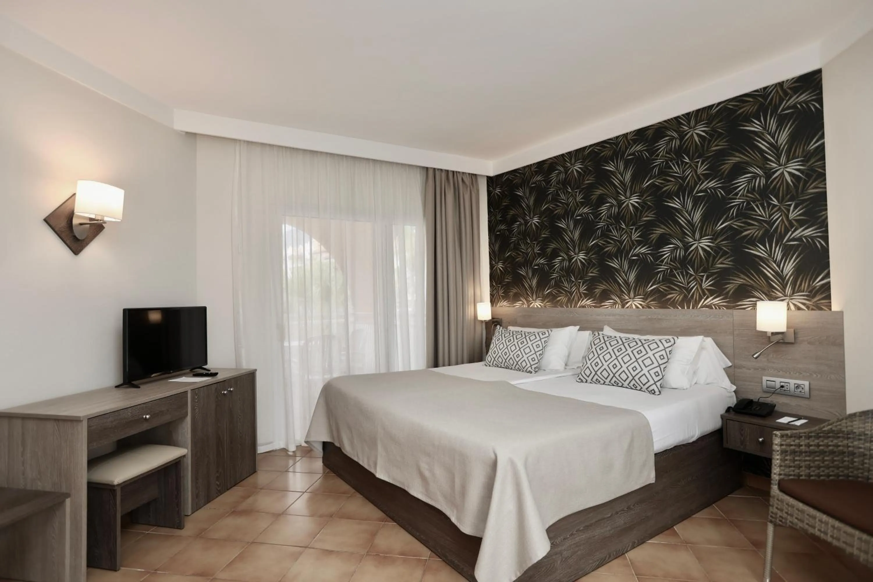 Bed in Hotel Puerto Palace