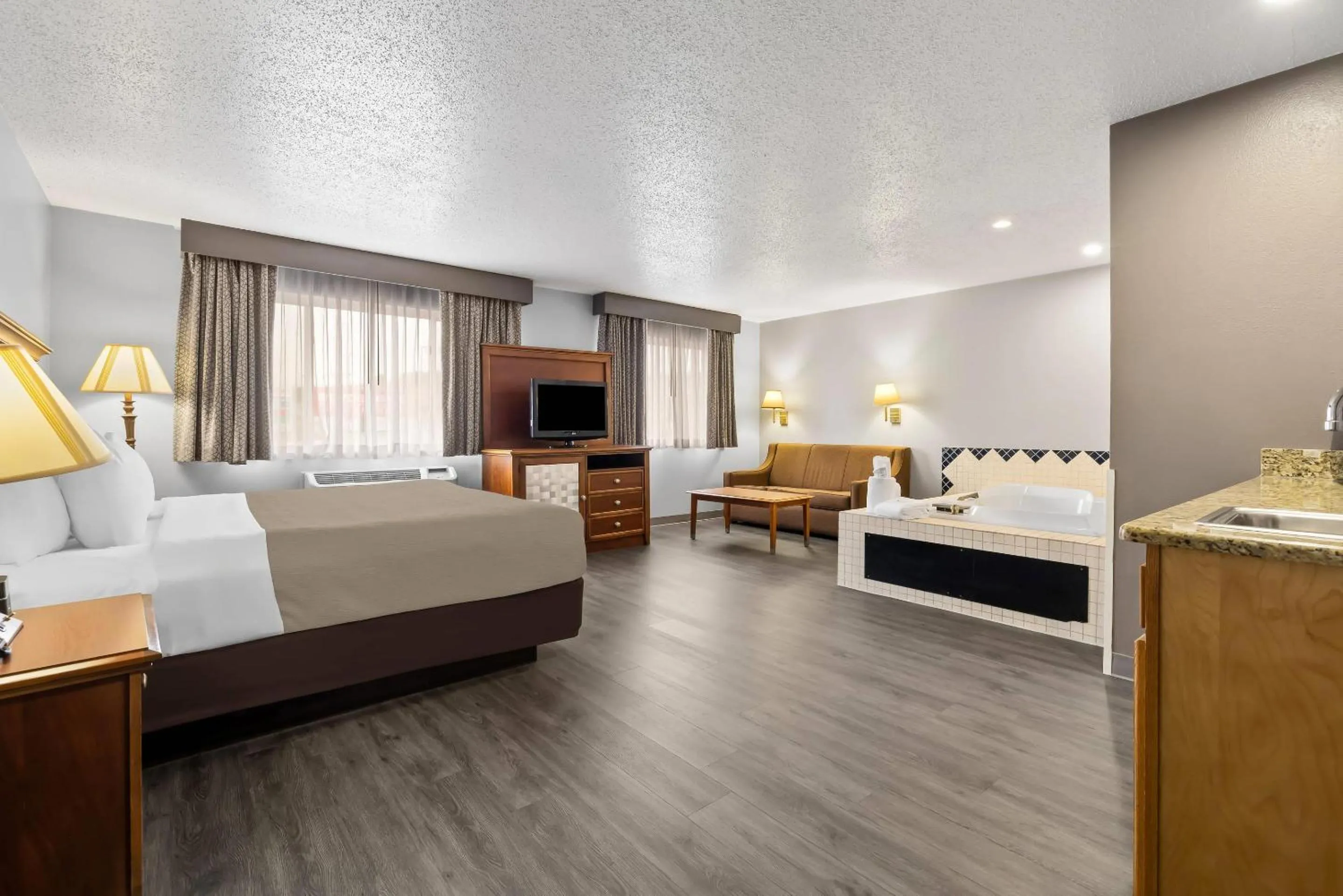 Bedroom, Bed in Quality Inn near Monument Health Rapid City Hospital