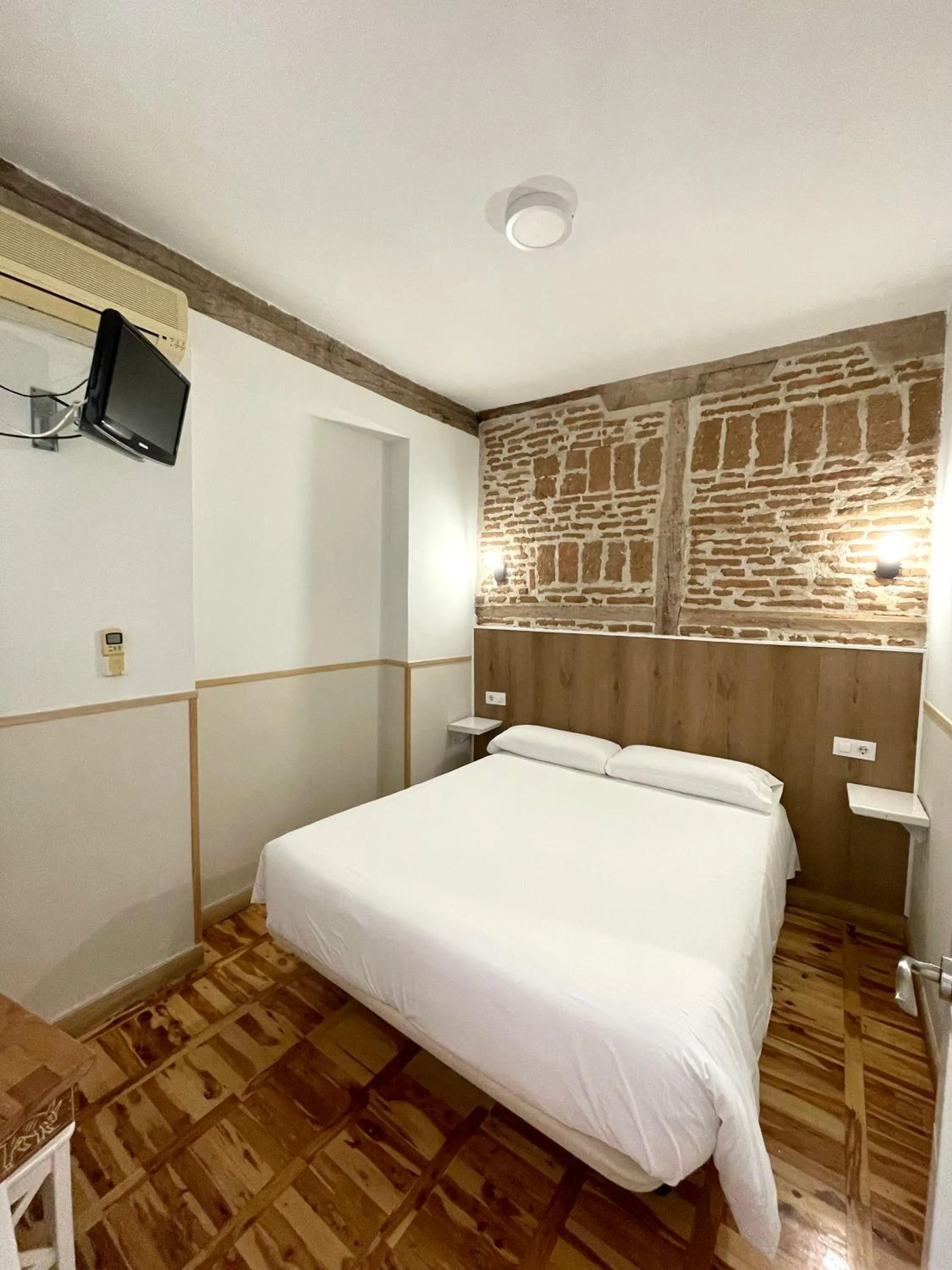 Bed in Apartamentos Mayor Centro