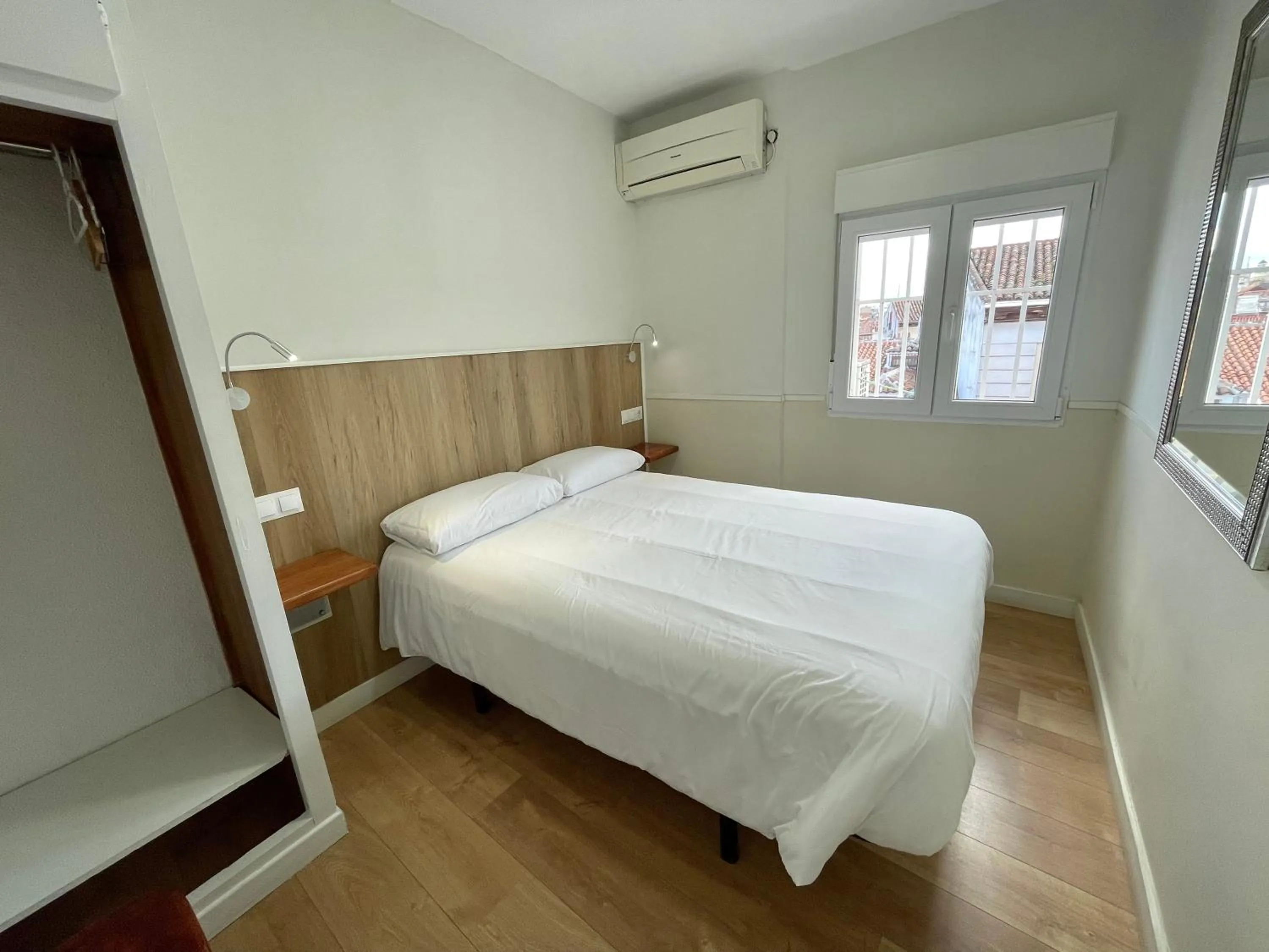 Bed in Apartamentos Mayor Centro