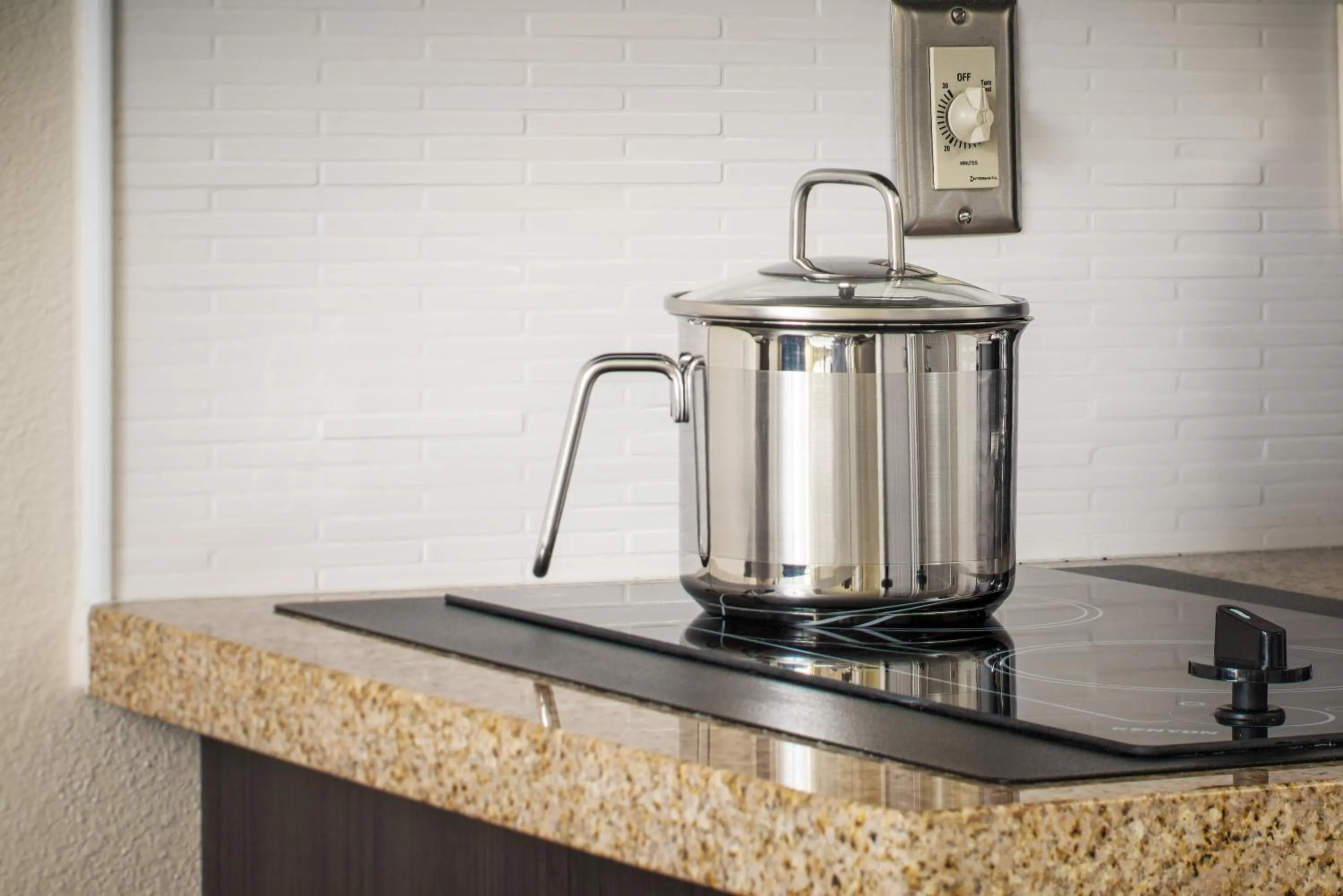 Bedroom in Candlewood Suites Bellevue by IHG