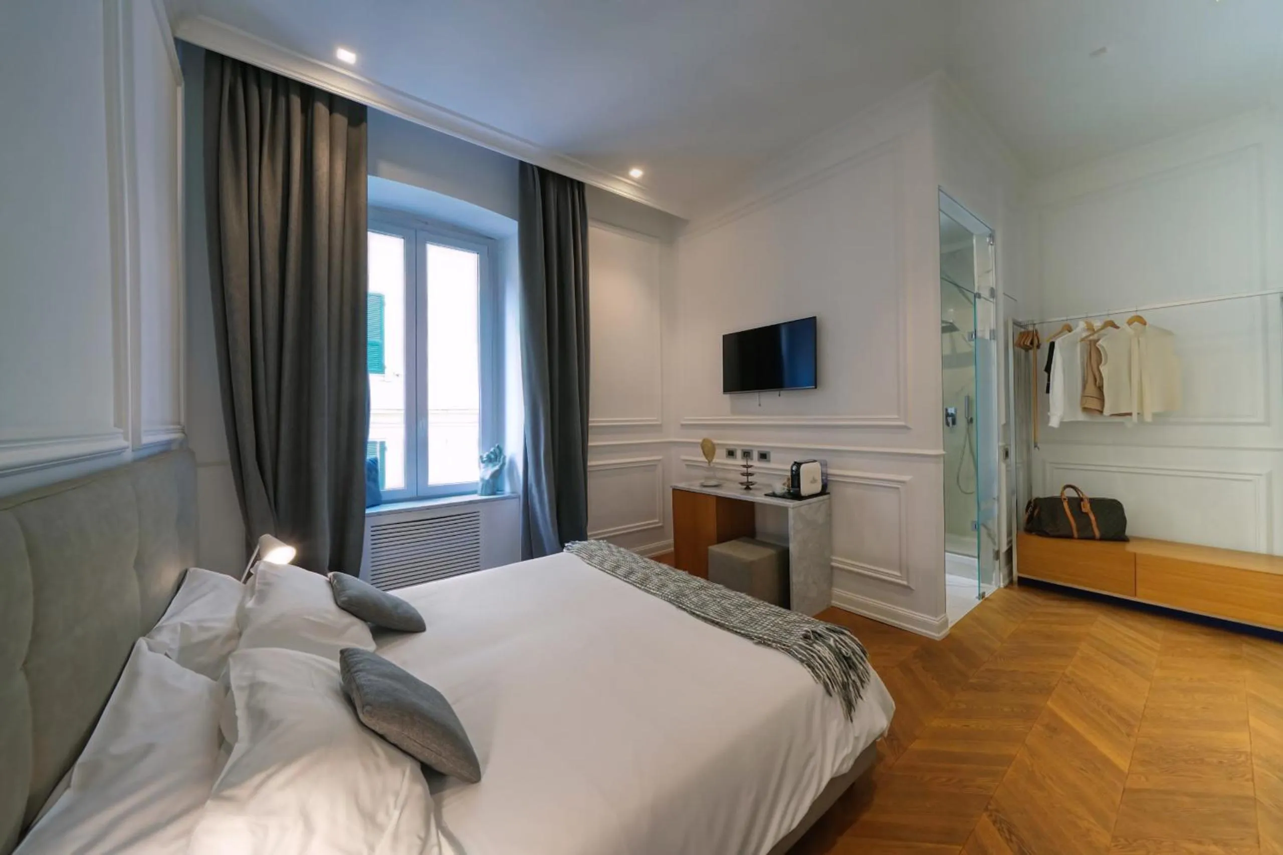 Bed in Via Chiodo Luxury Rooms